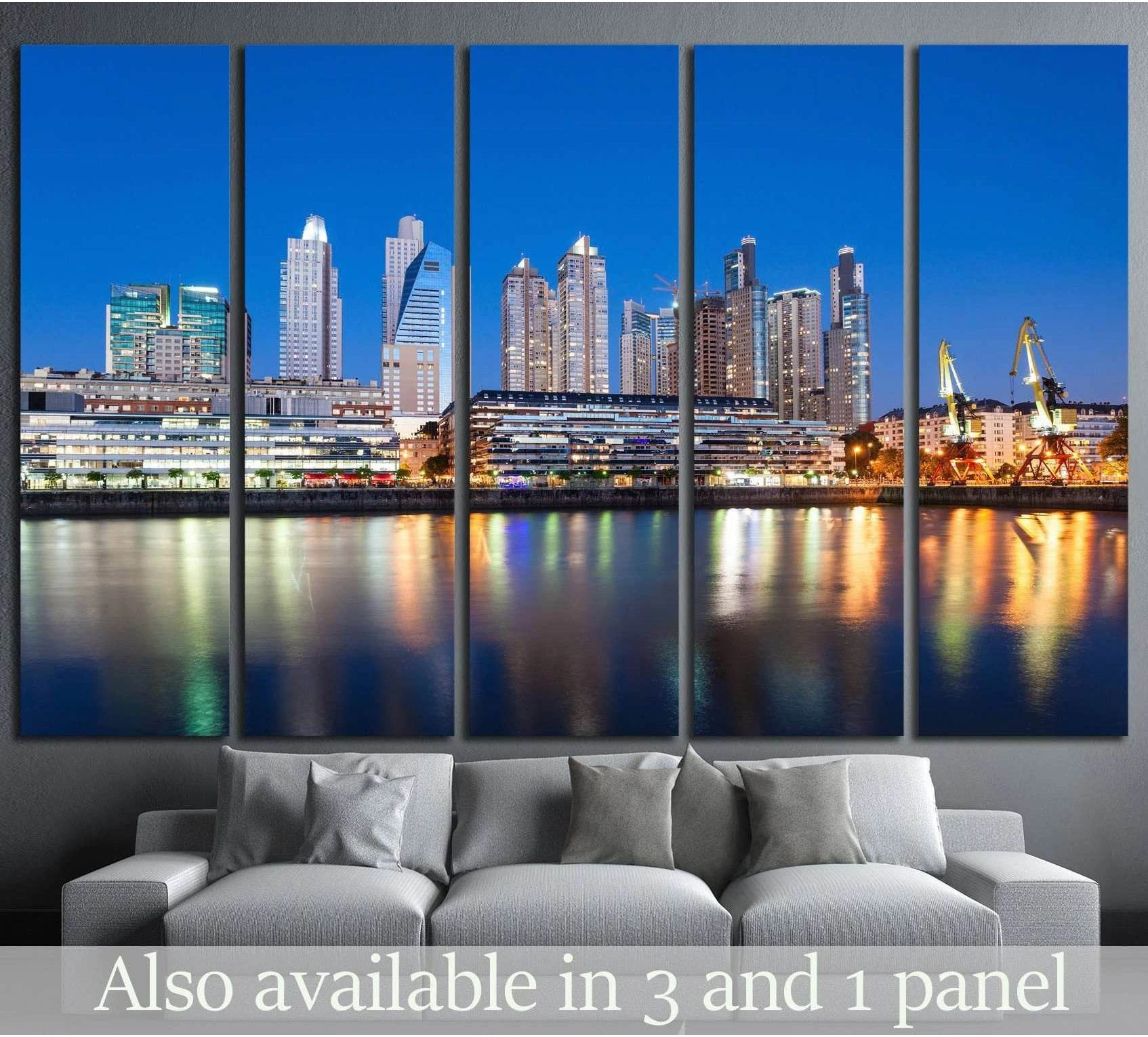Tampa skyline canvas print at twilight with waterfront reflections, shown as five panels above a sofa