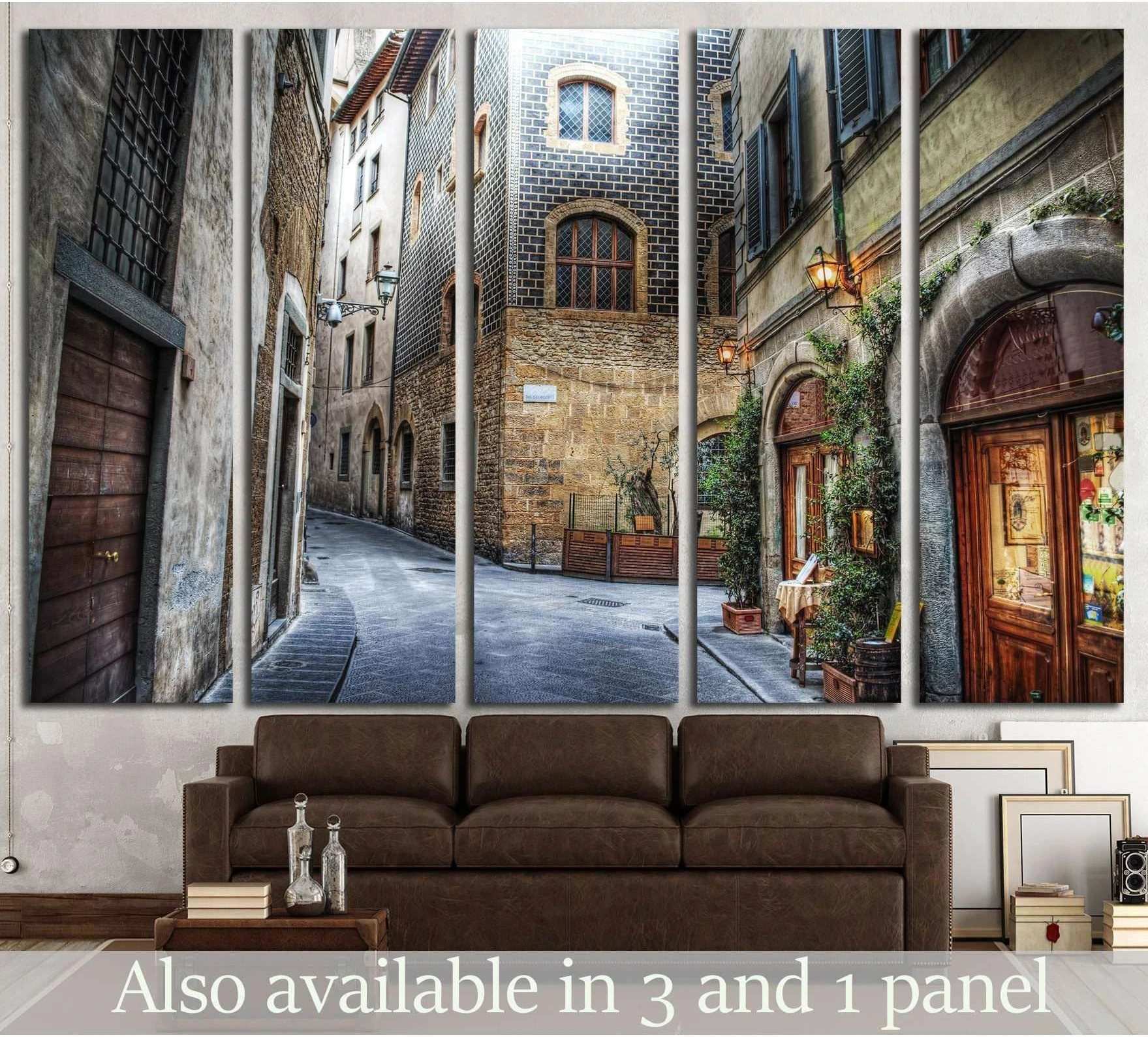 Florence alley canvas print showing a narrow Tuscan street above a sofa in a rustic living room