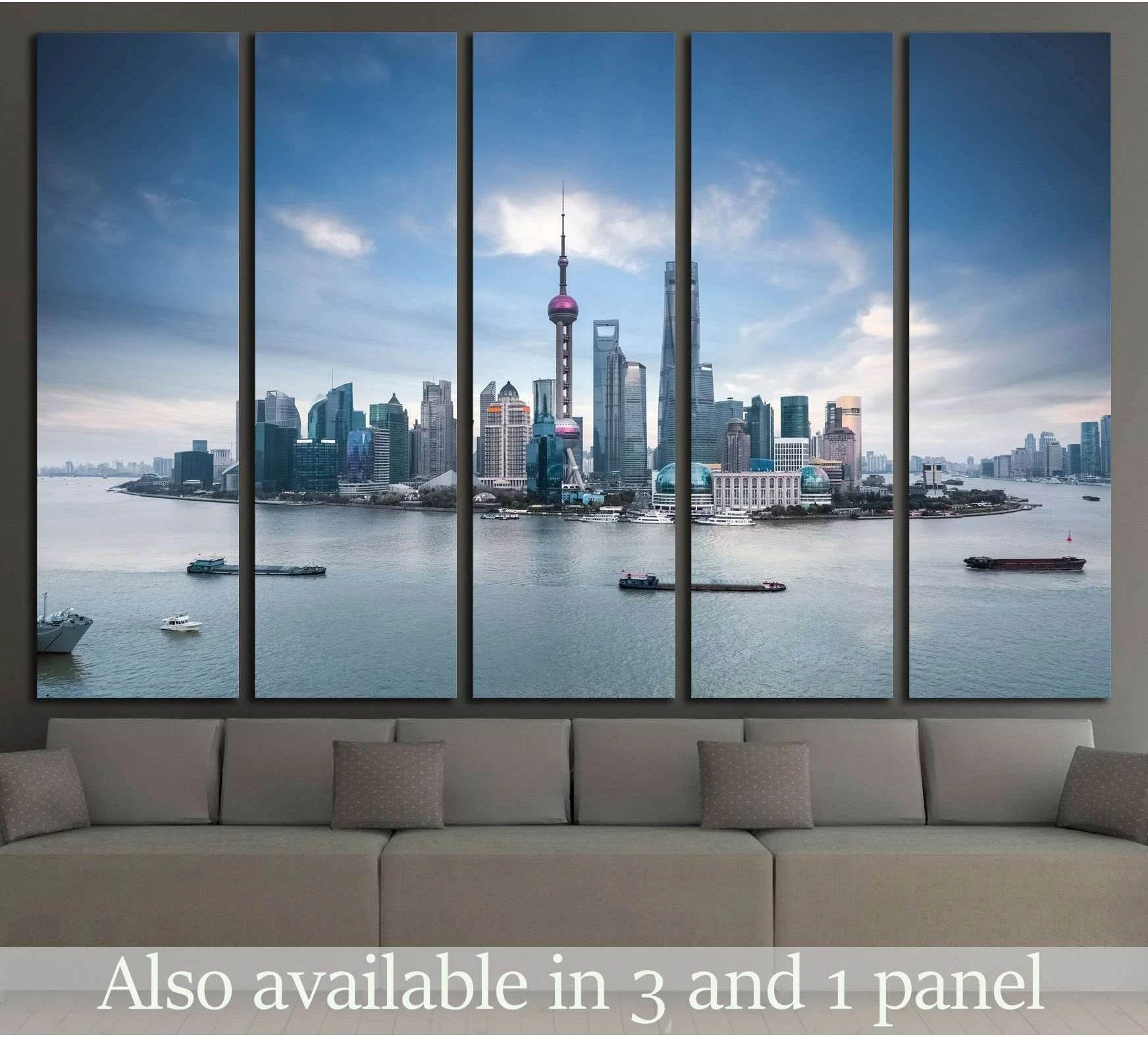 Shanghai skyline canvas print with the Huangpu River and Oriental Pearl Tower, displayed above a sofa