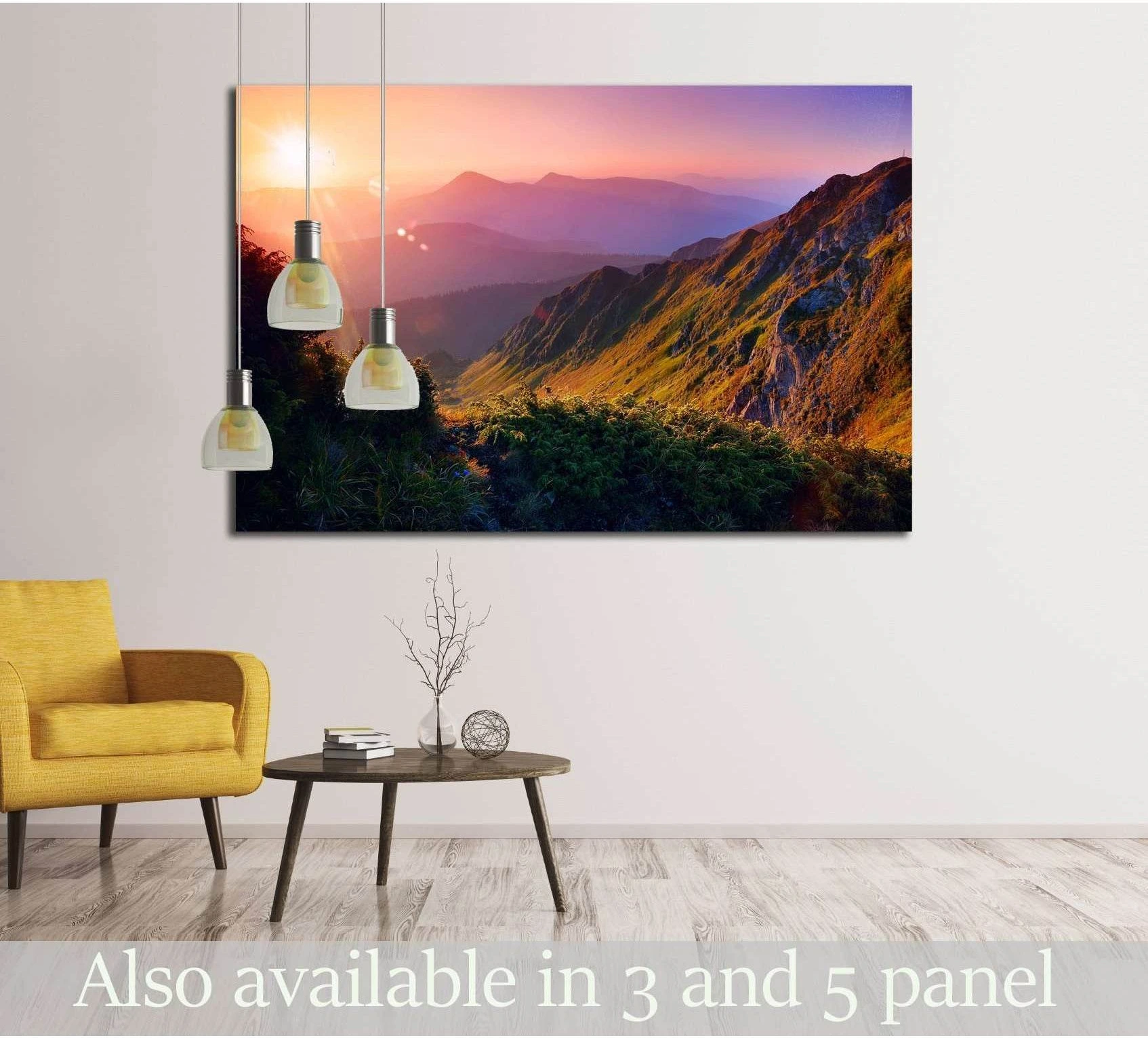 Mountain sunrise canvas print with golden ridges and pink-purple sky in a modern living room