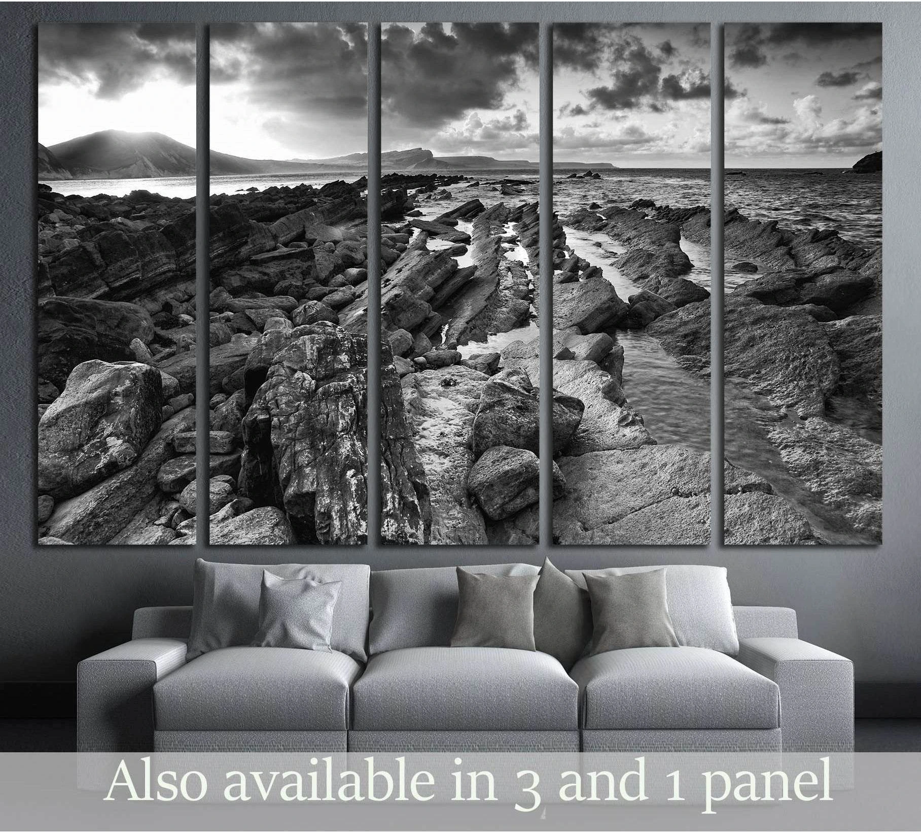 Beautiful sunrise landscape over Mupe Bay on Jurassic Coast in Dorset, England black and white showing blue ocean wall art with water and coastal depth.