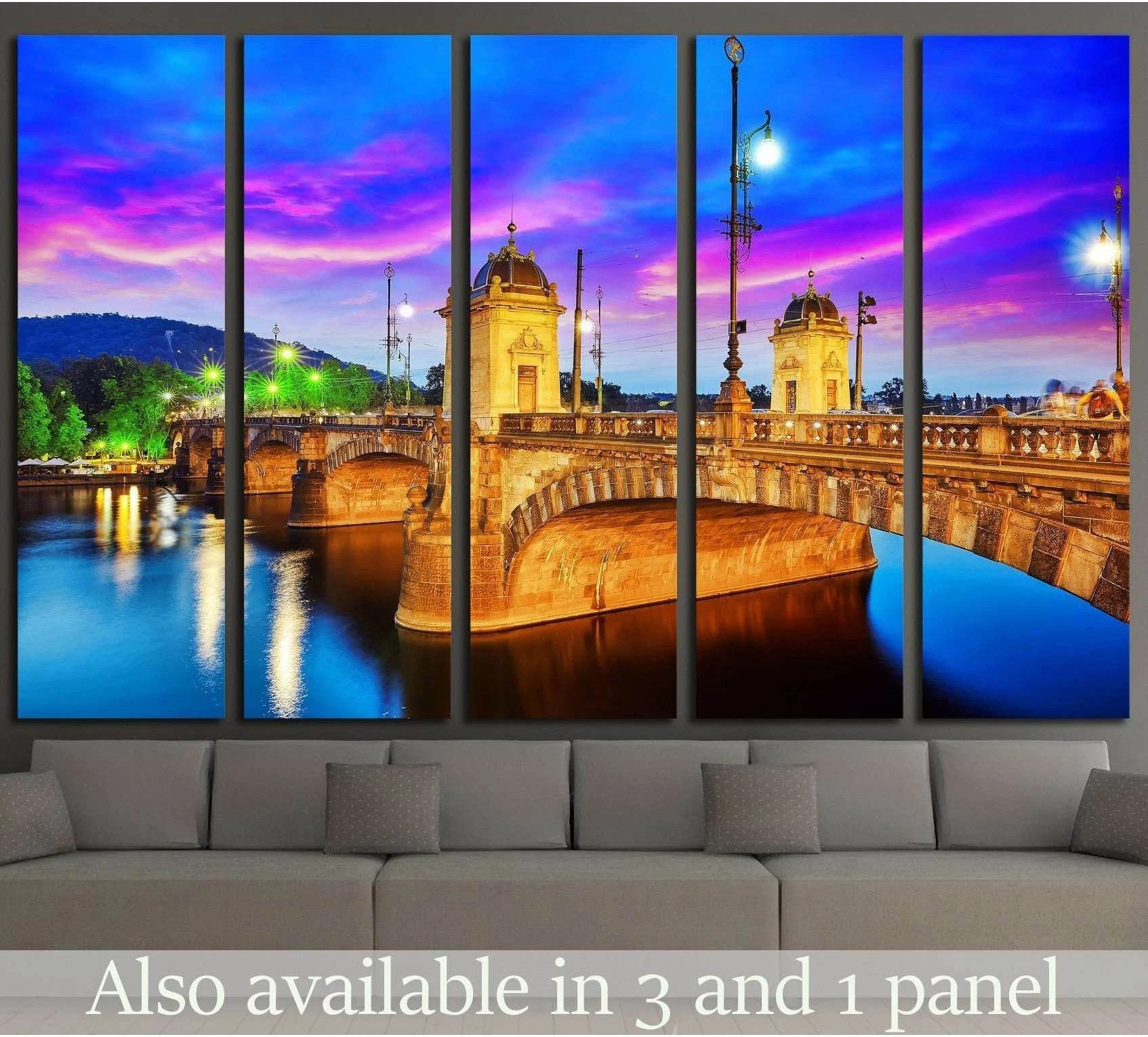 Prague Most Legii bridge canvas print with vivid sunset sky above a sofa in a modern living room