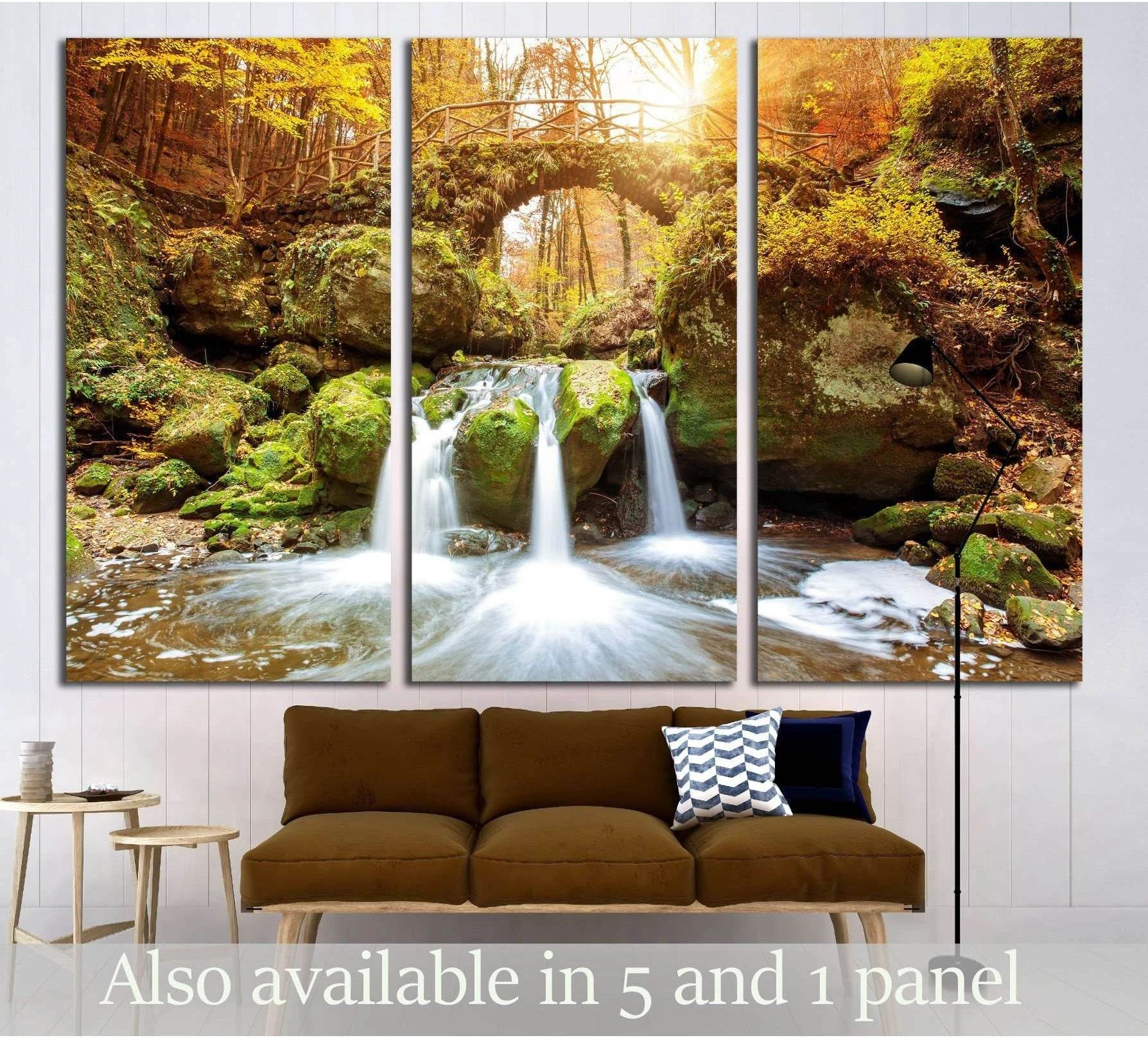 Mullerthal waterfall triptych canvas print with mossy rocks, stone bridge, and autumn forest above a sofa