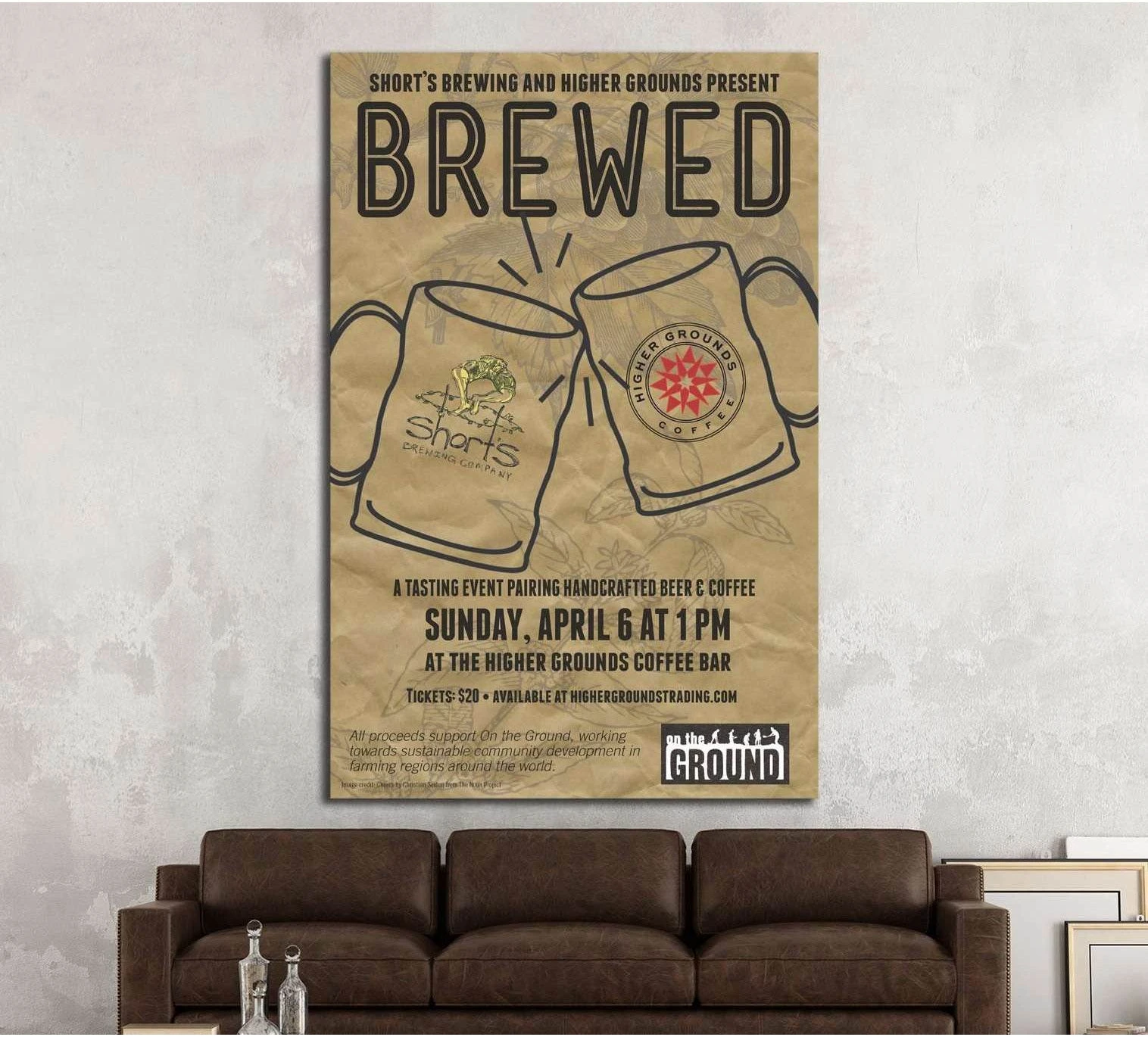 Beer and coffee poster canvas print with clinking mugs and vintage typography above a brown sofa