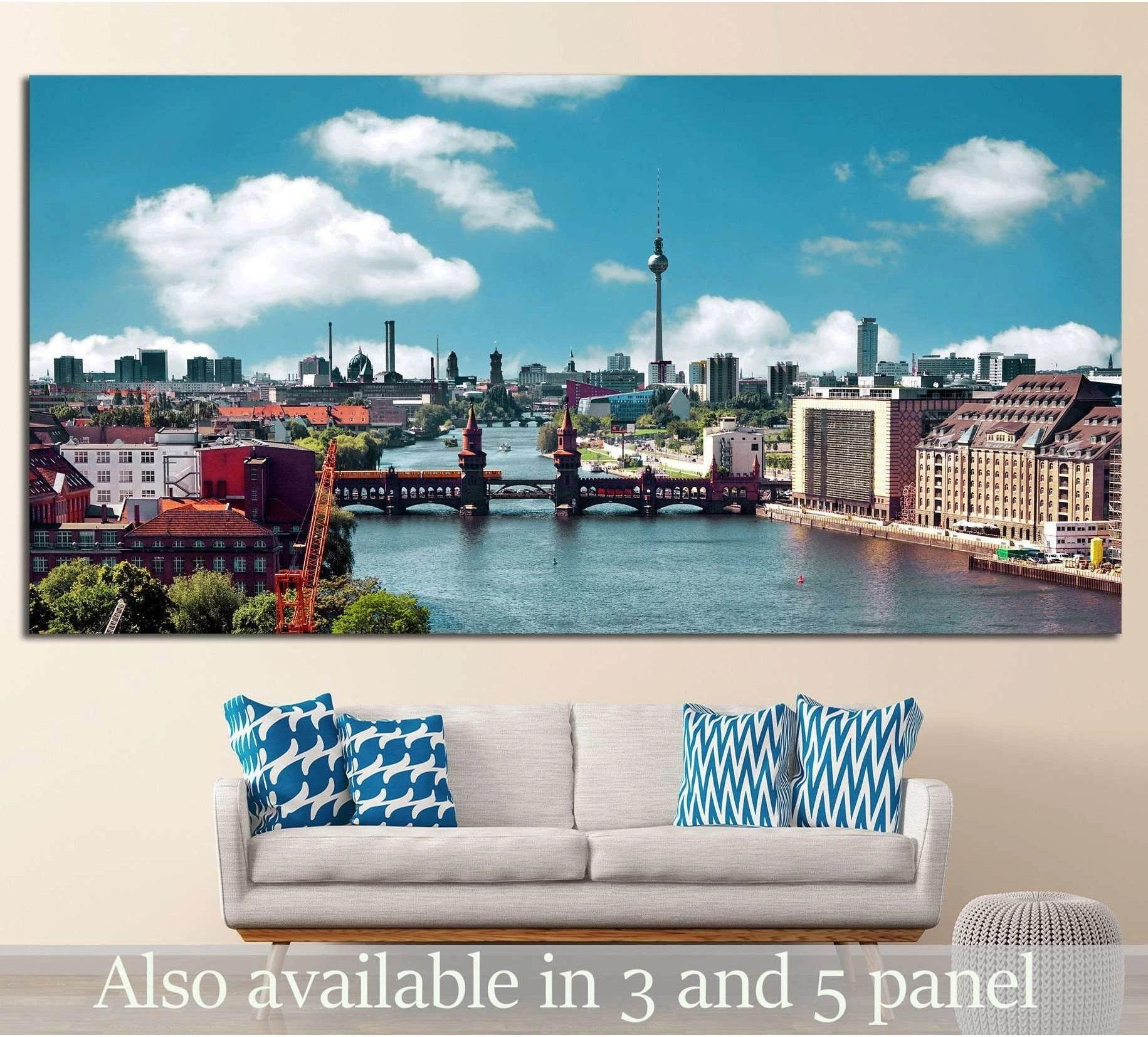 Berlin skyline canvas print with Oberbaum Bridge and TV Tower above a sofa in a modern living room
