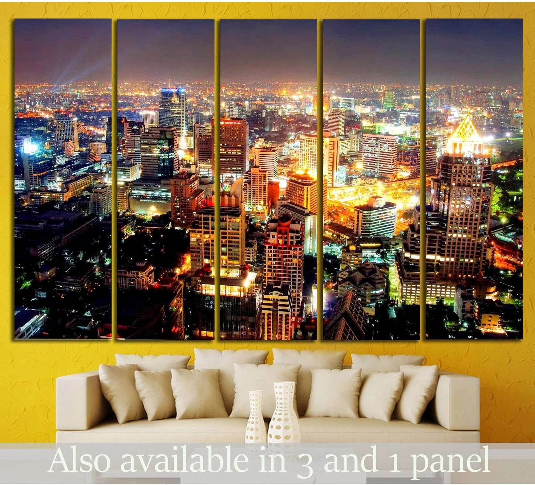 Bangkok skyline canvas print in five panels above a sofa with glowing city lights at night