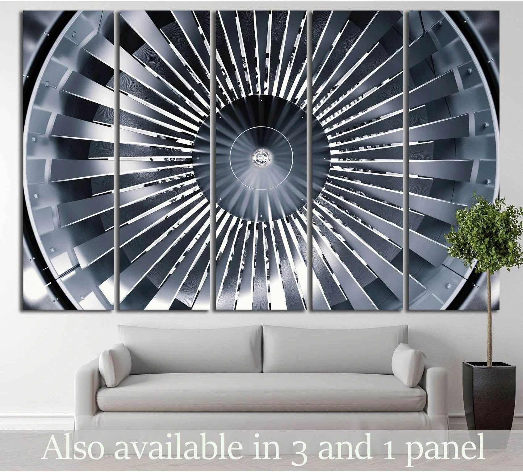 Front-facing jet engine turbine canvas print hung above a sofa in a modern living room