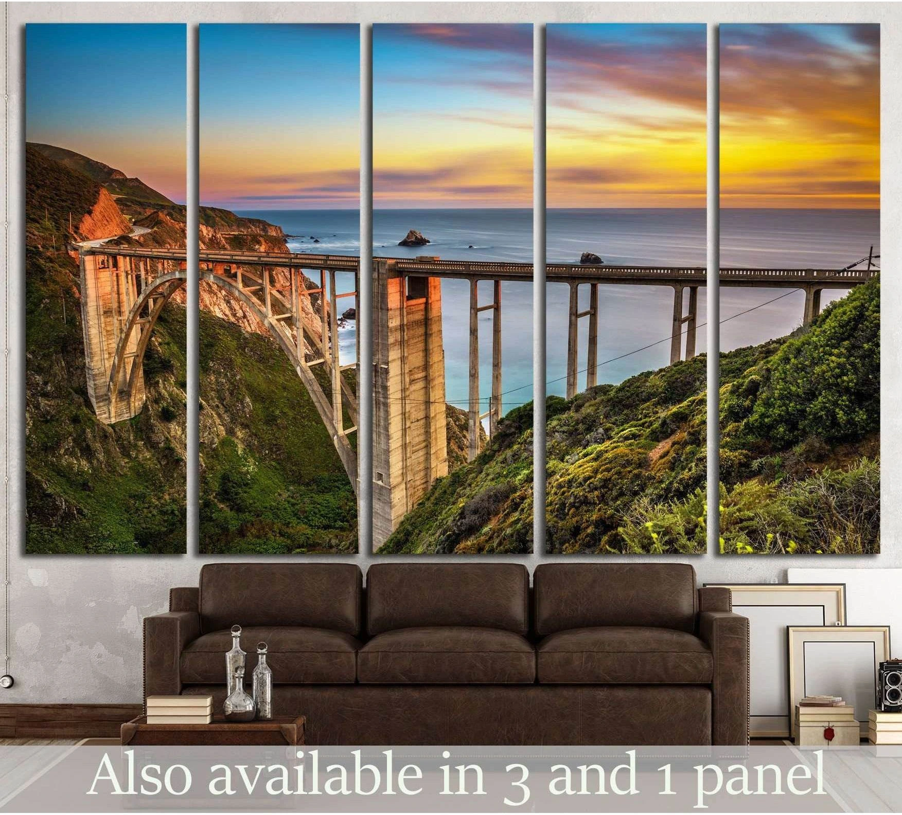 Bixby Bridge canvas print over Big Sur cliffs at sunset, displayed above sofa in living room