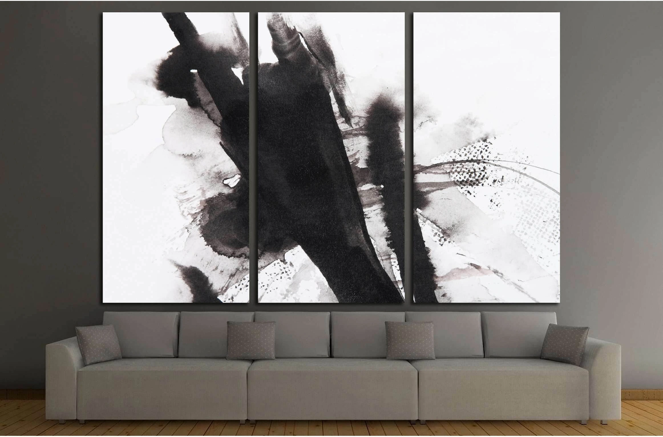 Abstract black and white painting with a central composition of thick, dark, and impasto brushstrokes and a background of white or light- or black-,