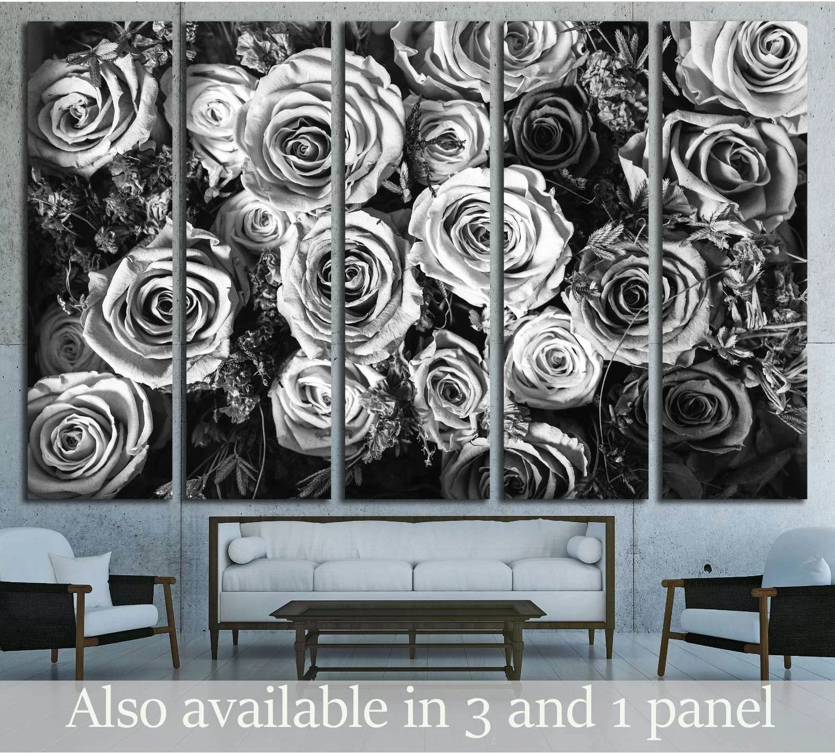 Black and white roses canvas print in a five-panel floral arrangement above a sofa in a modern living room
