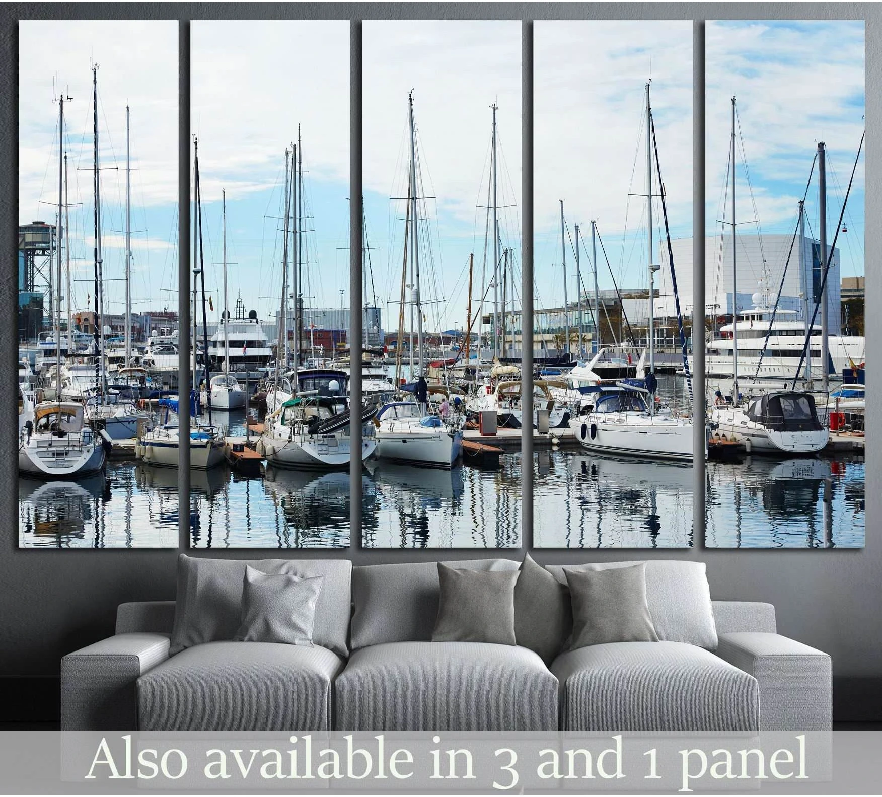 Barcelona marina sailboats canvas print hung above sofa in a modern living room