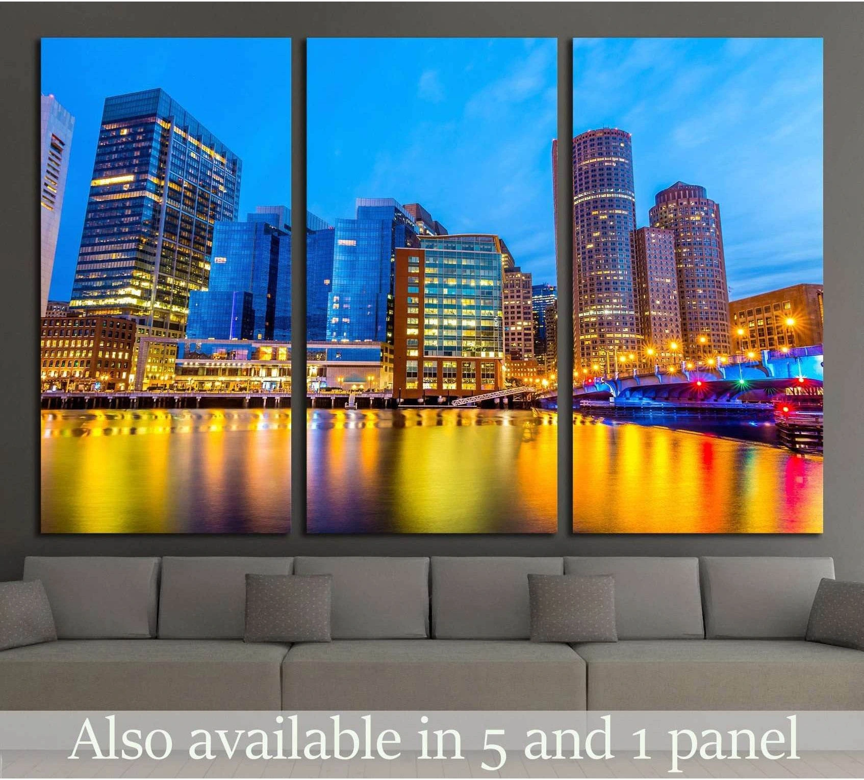 Boston harbor skyline canvas print with twilight city lights above a sofa in a modern living room