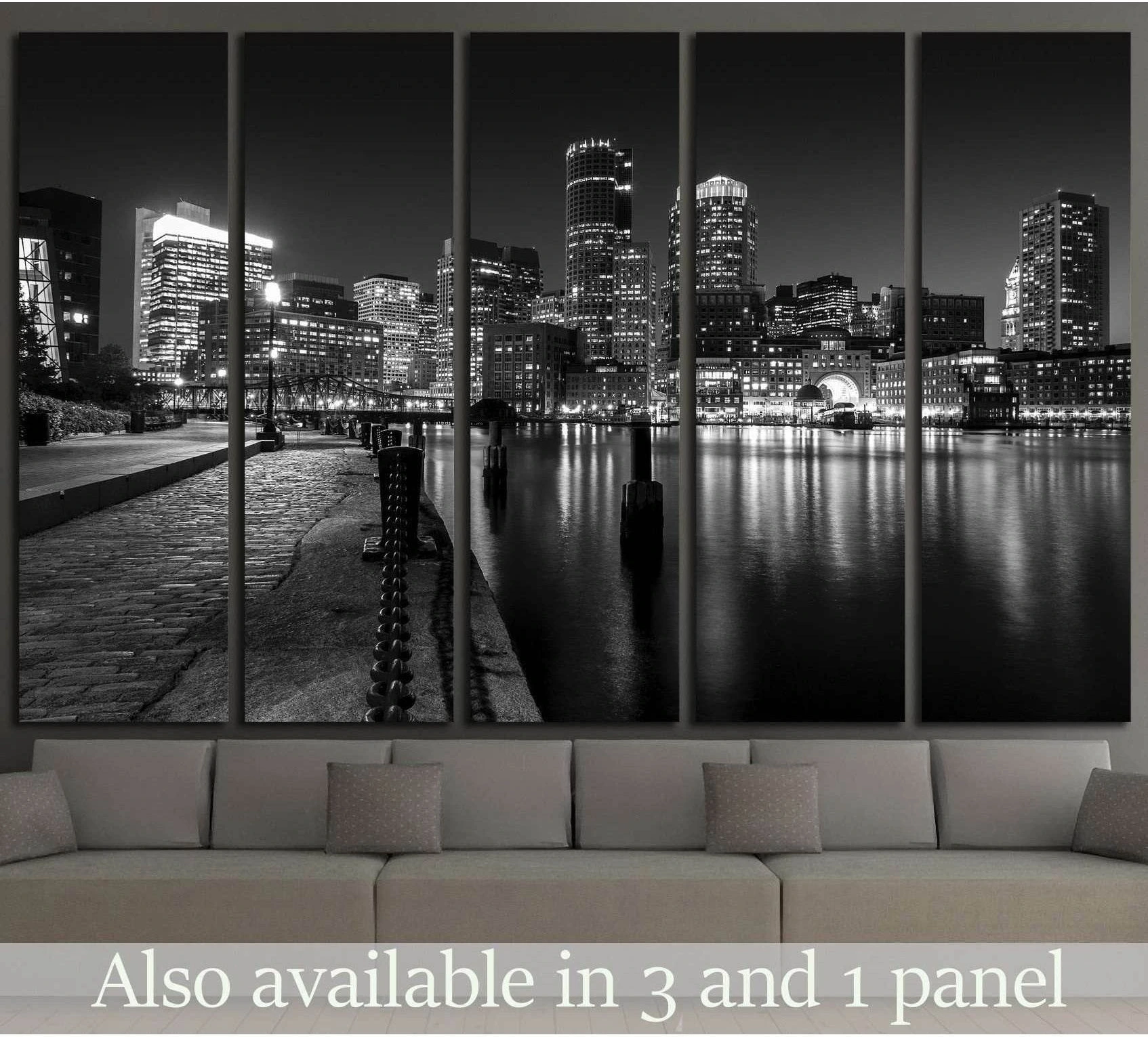 Black and white Boston Harbor skyline canvas print with waterfront reflections above a sofa