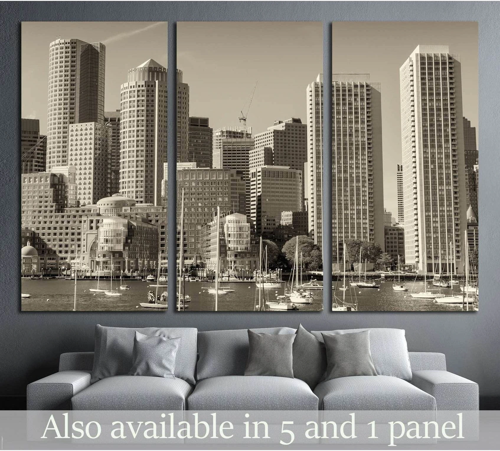 Sepia Boston skyline canvas print with harbor sailboats displayed above a gray sofa