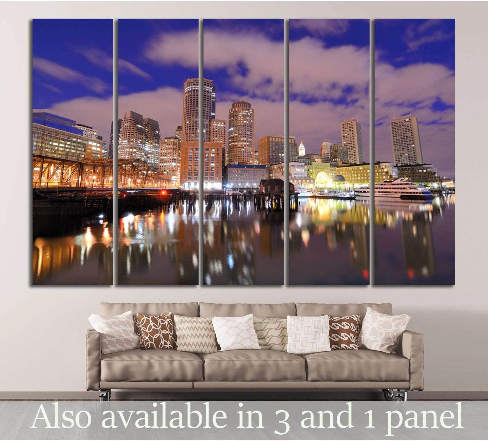 Boston skyline canvas print with glowing harbor reflections, shown as a five-panel artwork above a sofa