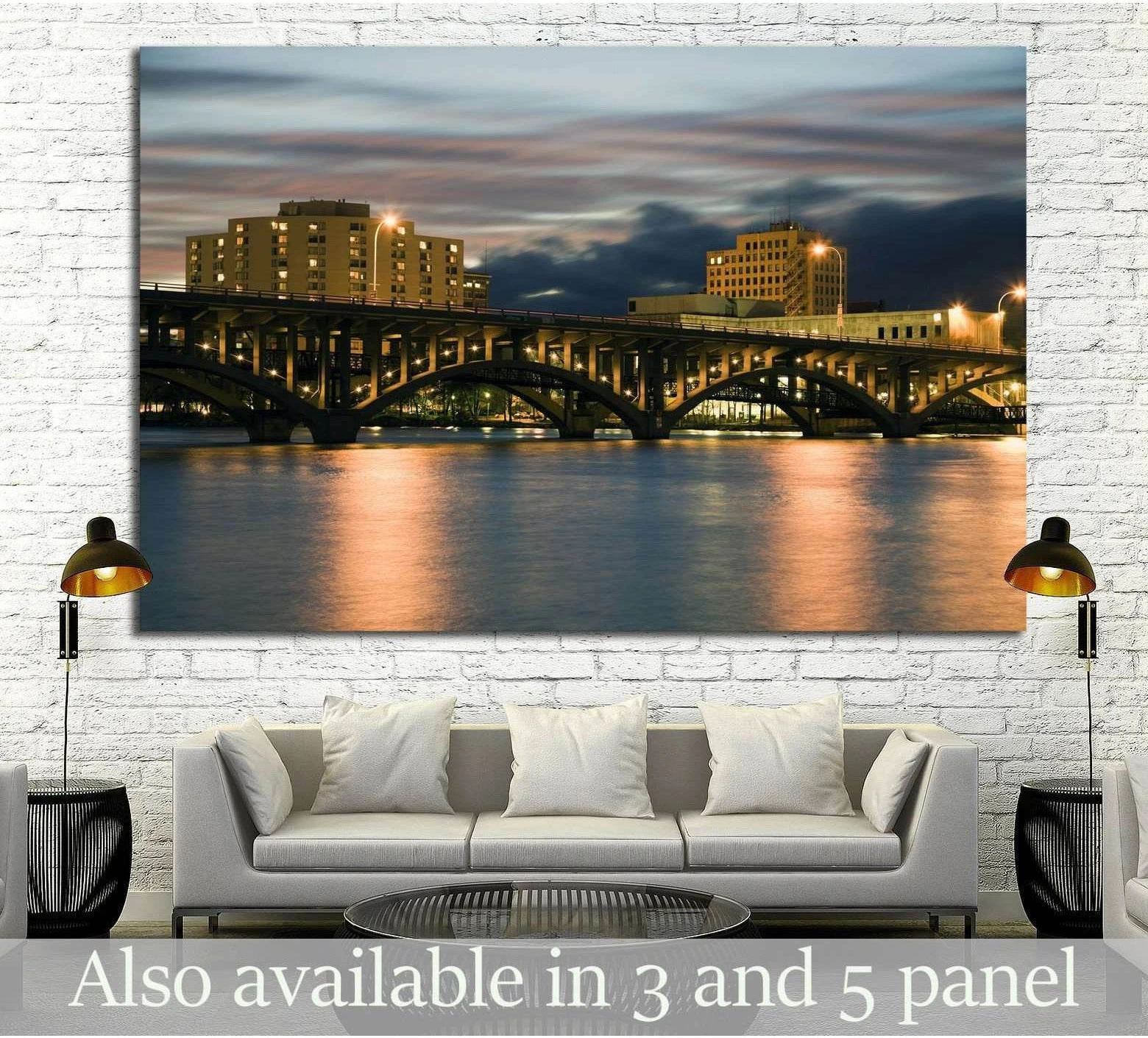 Rockford bridge canvas print at dusk above a sofa with glowing city lights and river reflections