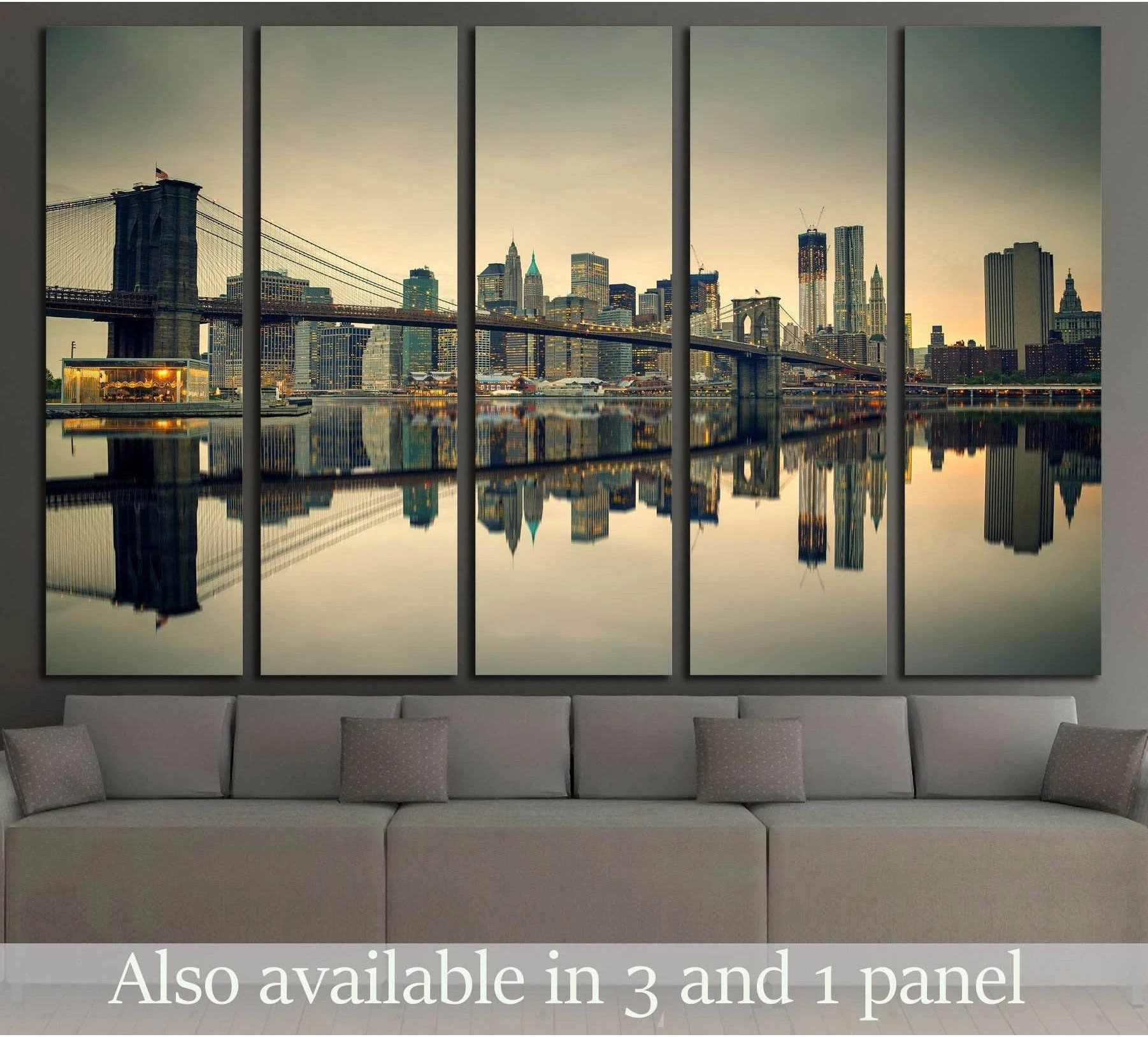 Brooklyn Bridge and Manhattan skyline canvas print at dusk above a sofa in a modern living room