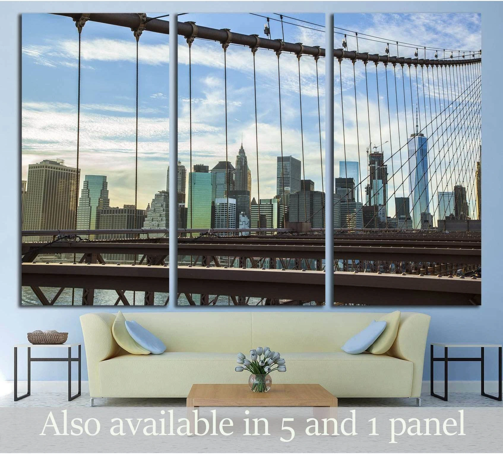 Brooklyn Bridge wires with Manhattan skyline canvas print above a sofa in a modern living room