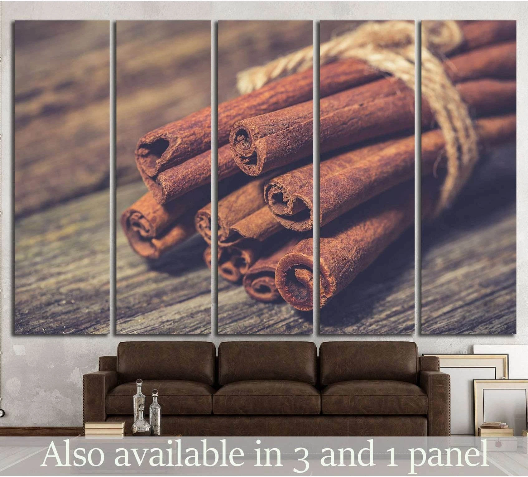 Cinnamon sticks canvas print tied with rope on rustic wooden table, shown in a warm living room mockup