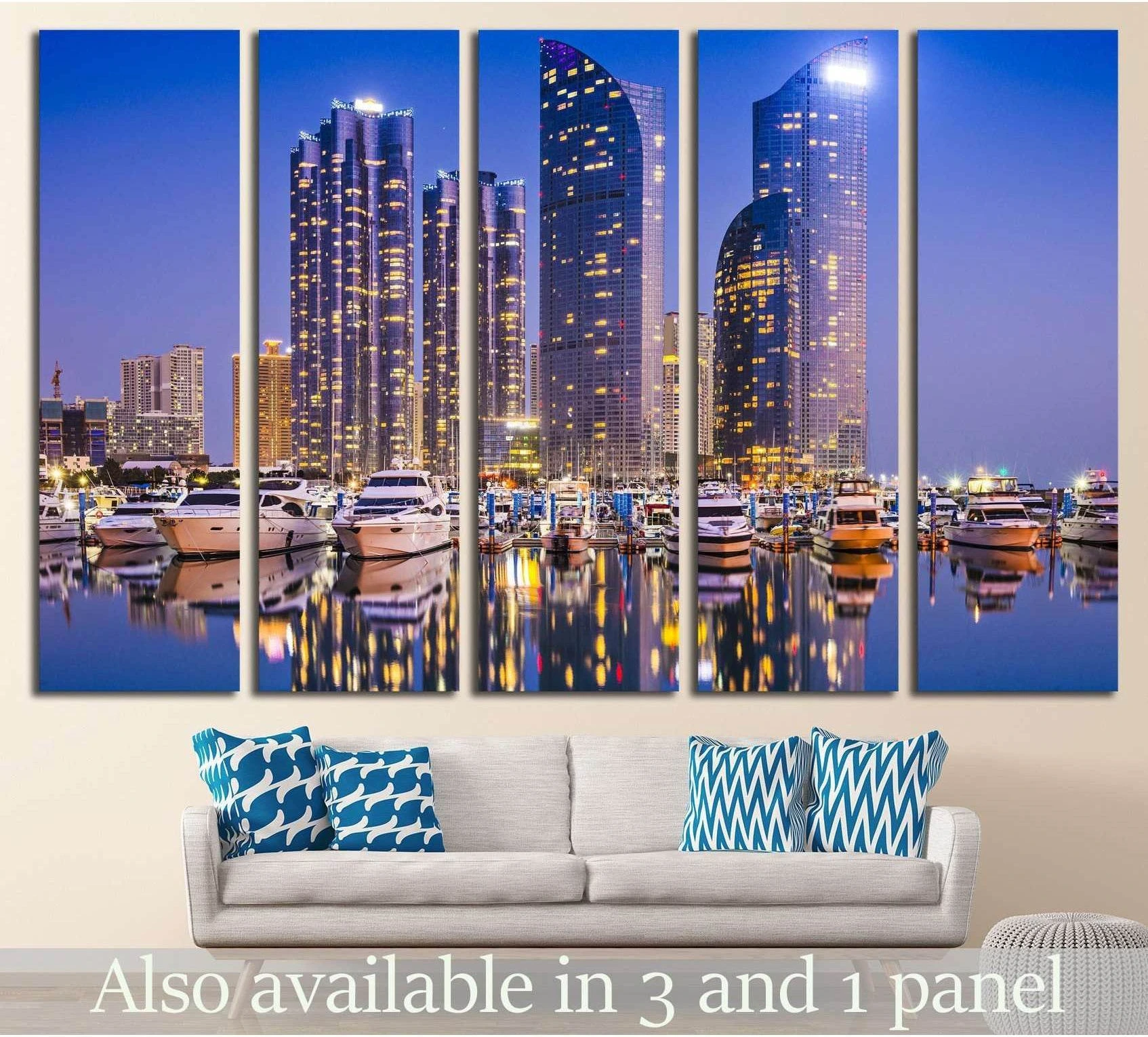 Busan marina skyline canvas print with yachts and blue-lit towers displayed above a sofa