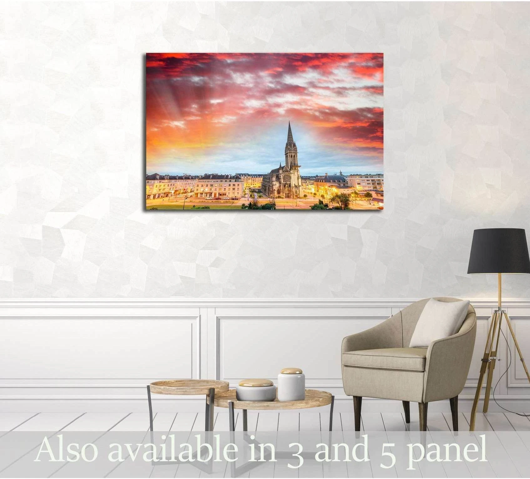 Caen cathedral sunset skyline canvas print displayed above a sofa in a neutral living room