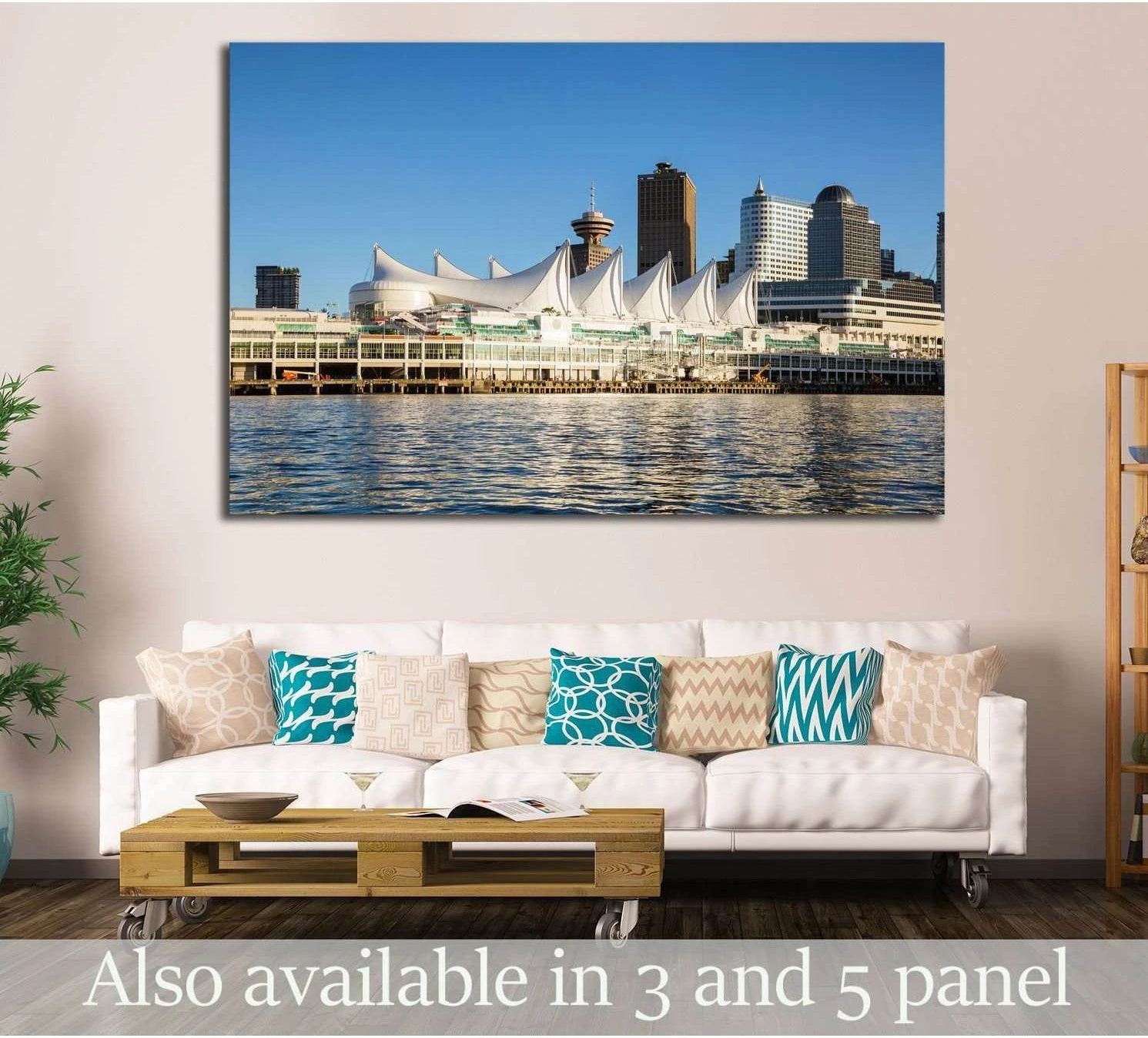 Vancouver Canada Place canvas print with white sails and skyline above sofa in a modern living room