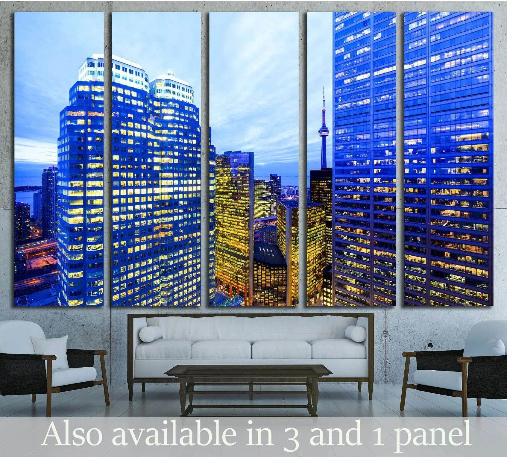 Toronto skyline canvas print with CN Tower between blue-lit downtown towers above a sofa