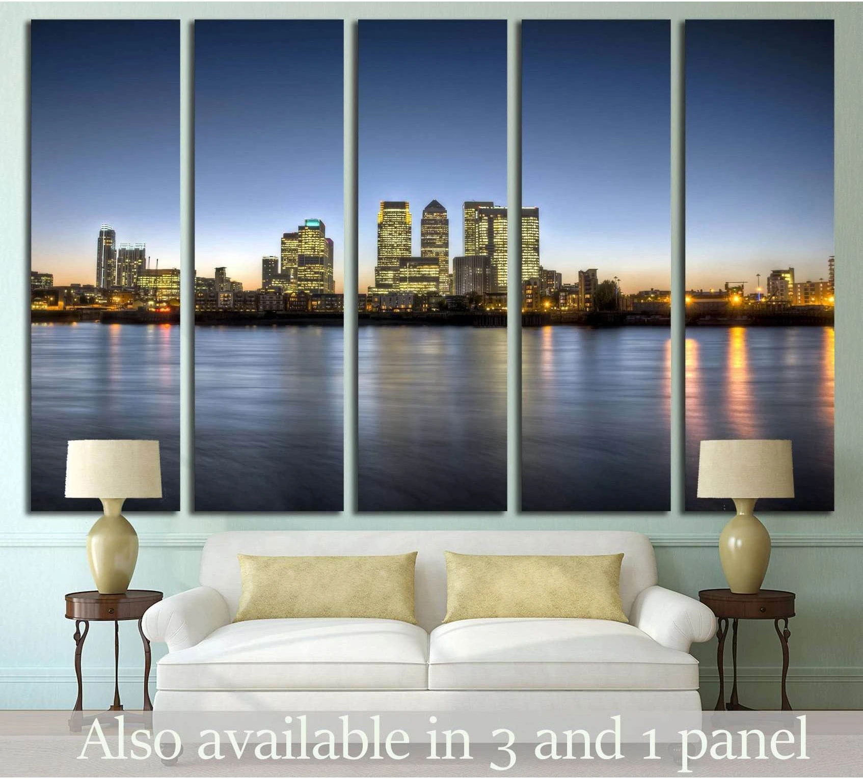 Canary Wharf skyline canvas print in five panels above a sofa with blue dusk sky and river reflections