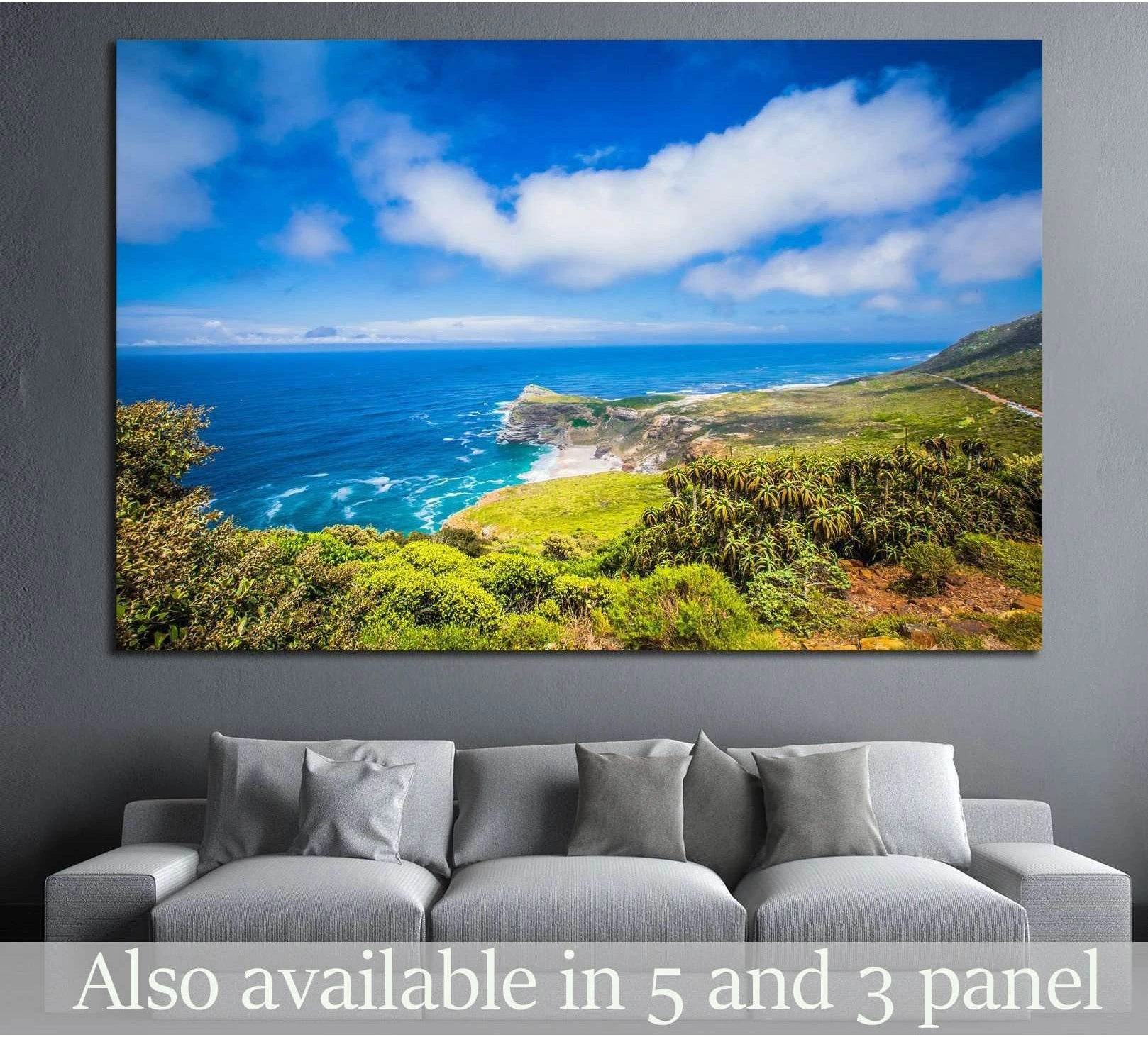 Cape Point South Africa canvas print above a sofa with blue ocean, cliffs, and green headland