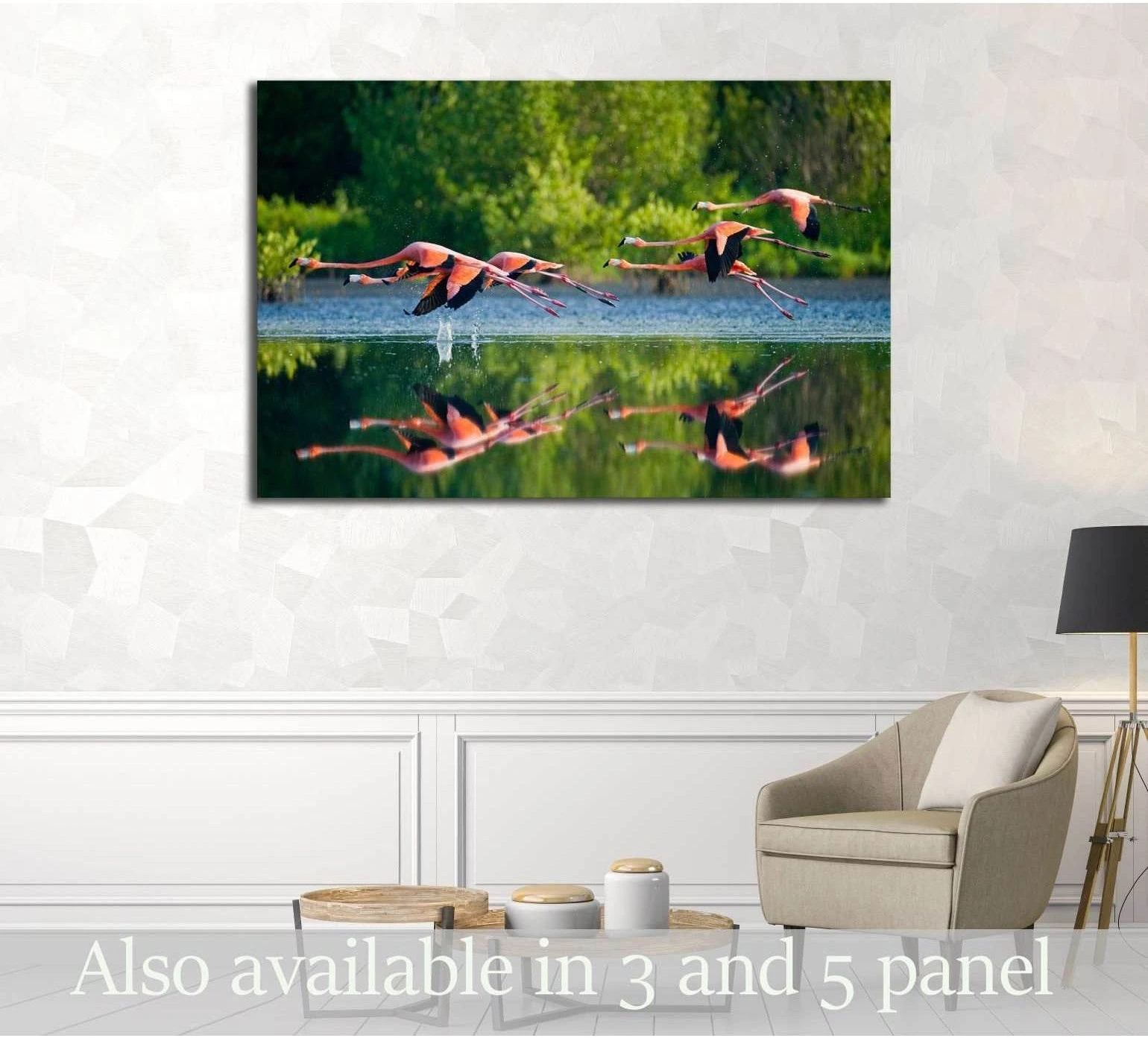 Flamingo canvas print with pink birds over reflective water, displayed in a neutral living room
