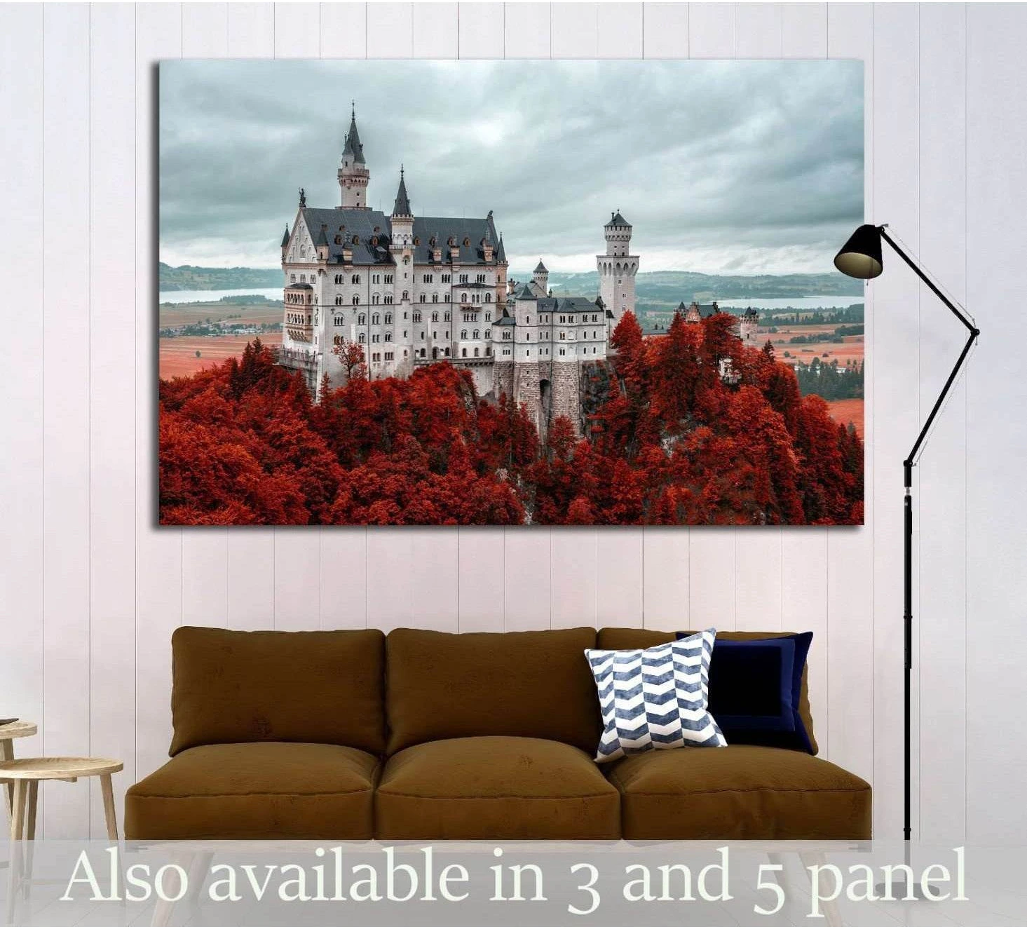 European castle canvas print above a sofa with red autumn forest and cloudy sky