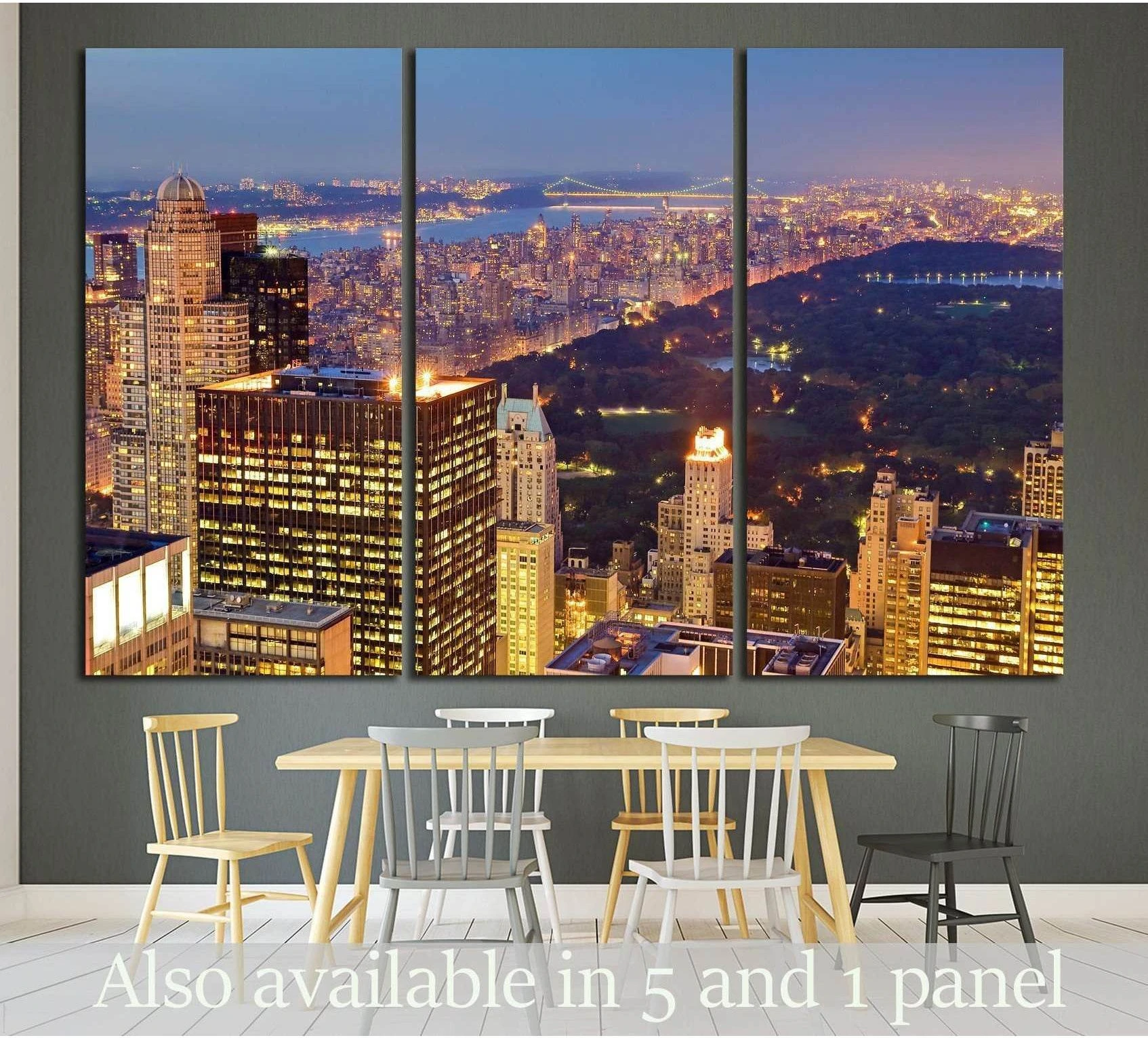 Triptych Central Park canvas print with glowing Manhattan skyline at night above a dining table