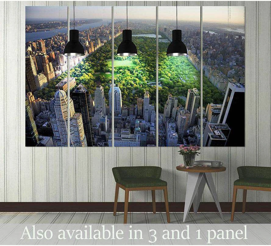 Central Park aerial canvas print with Manhattan skyline displayed as multi panel wall art above chairs