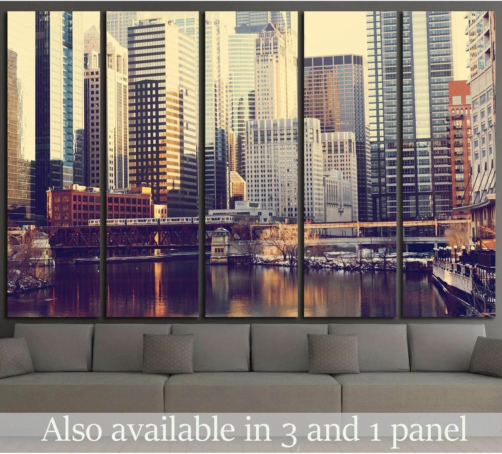 Chicago skyline canvas print with river reflections above sofa in a modern living room