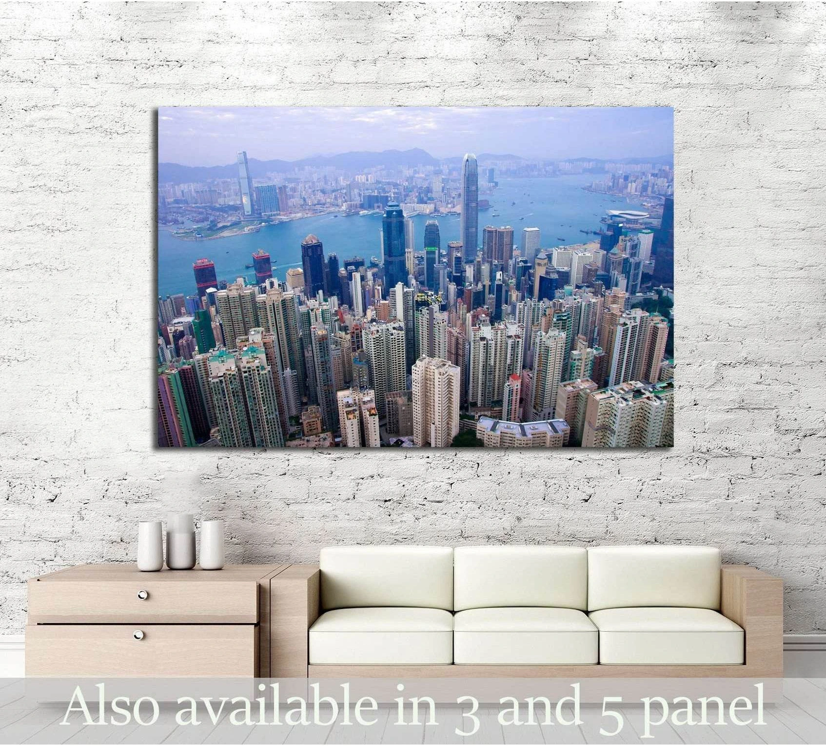 Aerial Hong Kong skyline canvas print above a sofa with Victoria Harbour and dense skyscrapers
