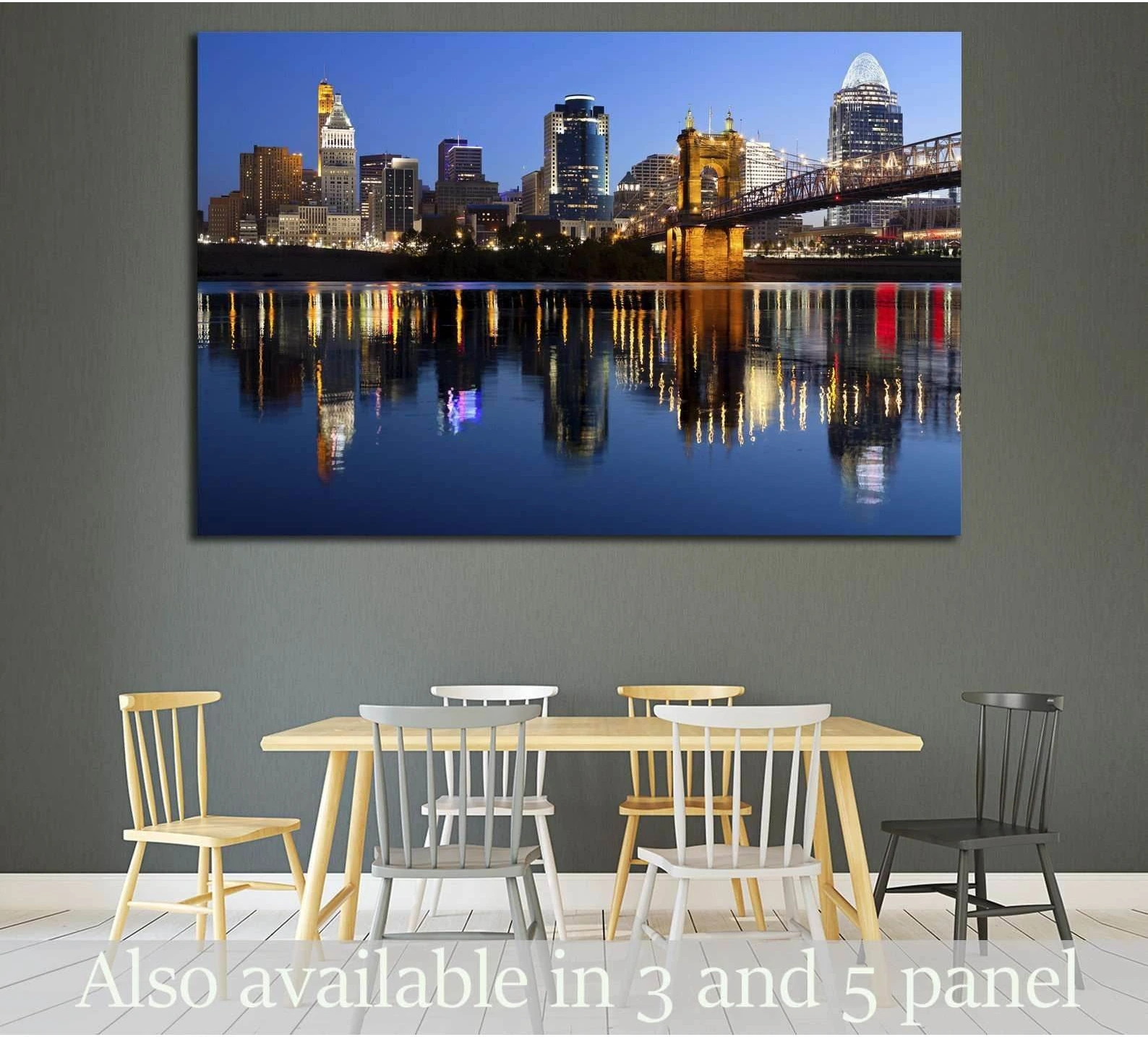 Cincinnati skyline and John A. Roebling Bridge canvas print above dining table at twilight