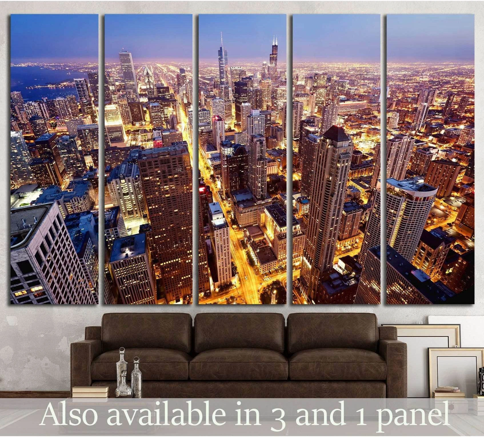 Chicago night skyline canvas print in five-panel layout above a brown sofa in a modern living room