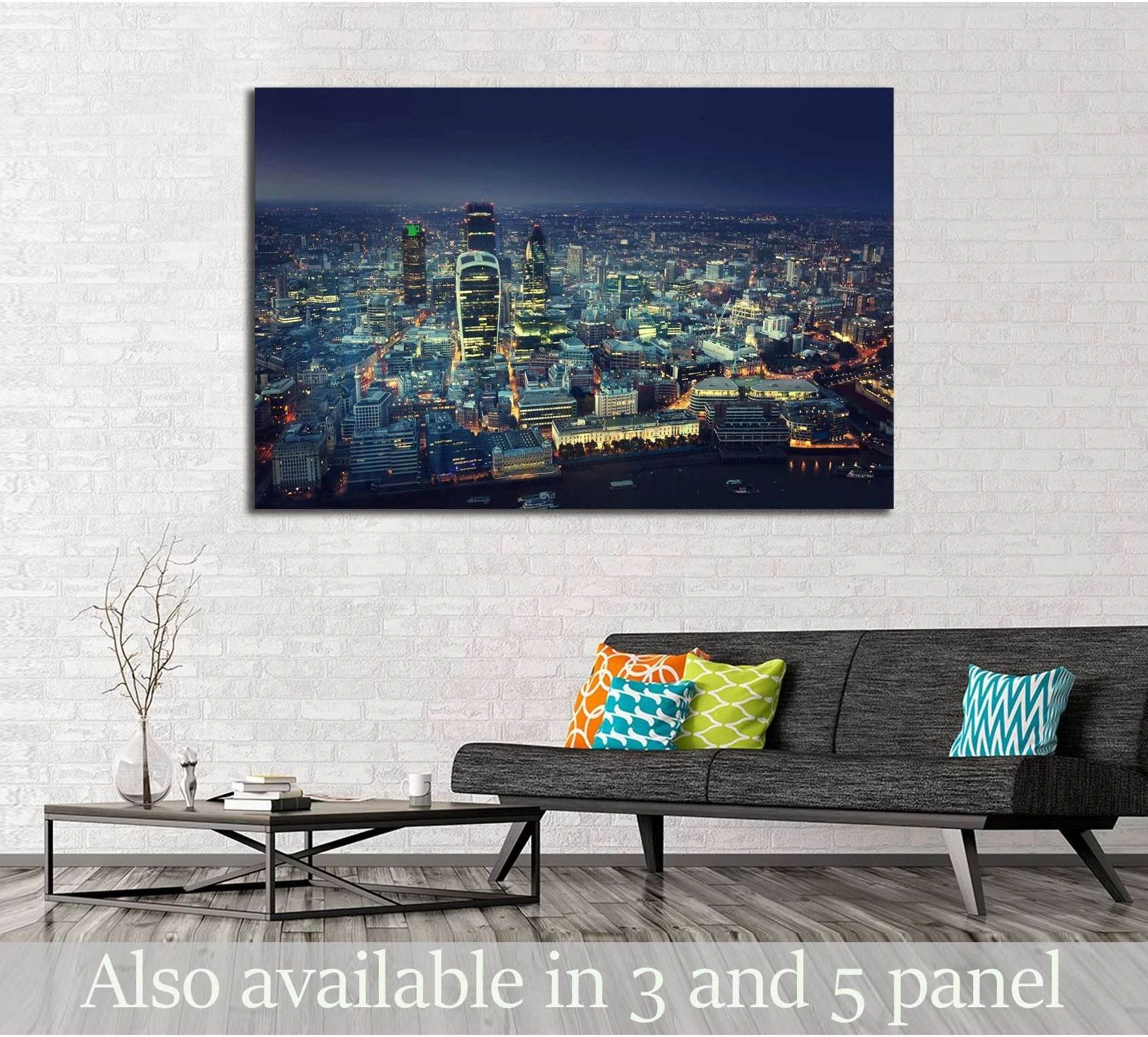City of London skyline canvas print at dusk displayed above a sofa in a modern living room