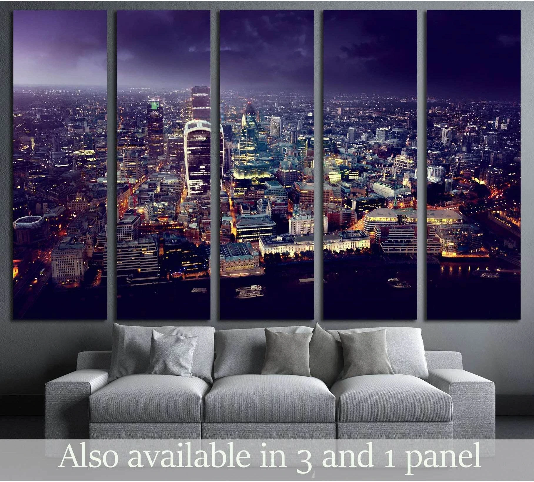 City of London sunset skyline canvas print above a gray sofa in a modern living room