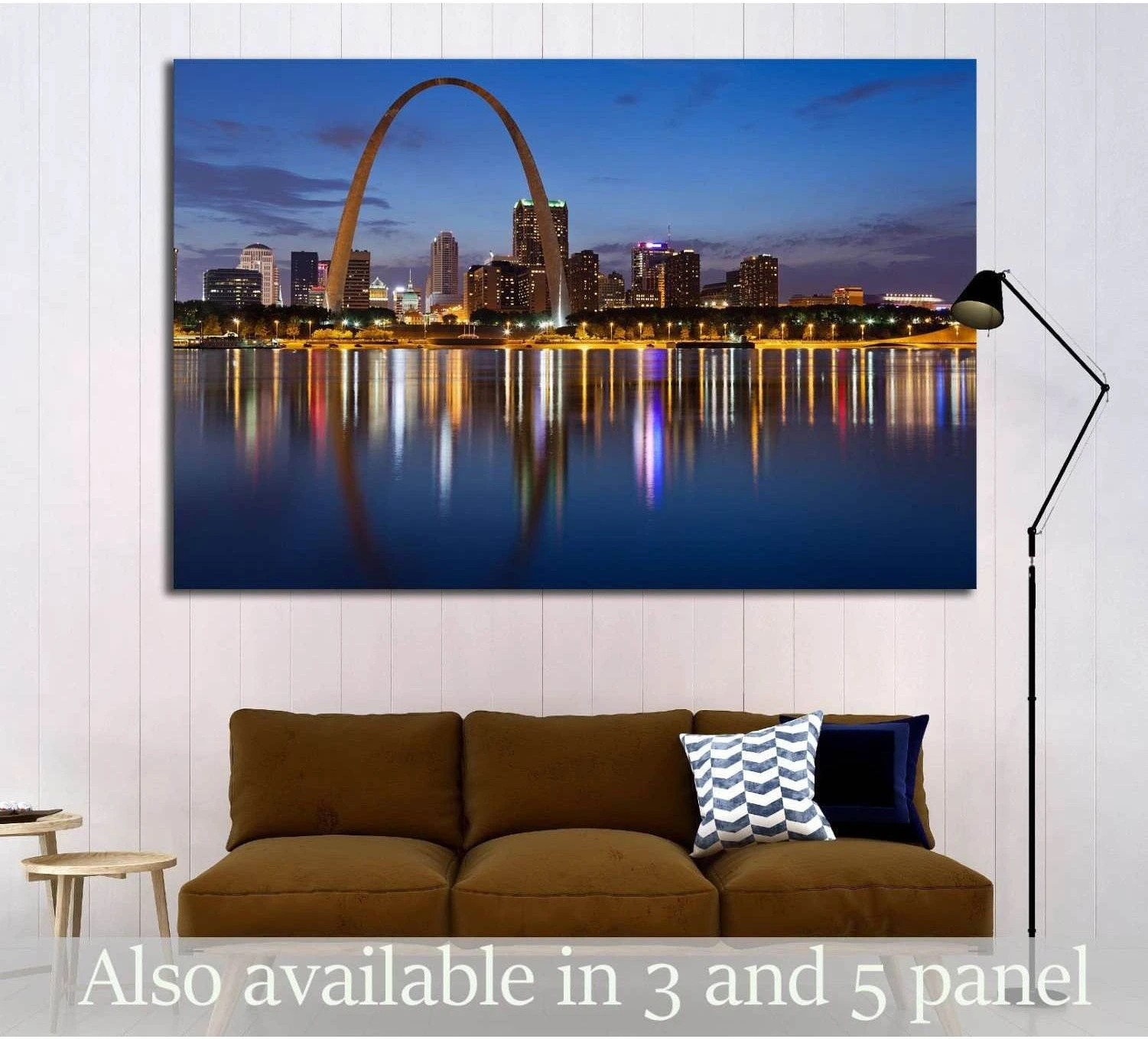 St Louis skyline canvas print with Gateway Arch at twilight above sofa in a modern living room