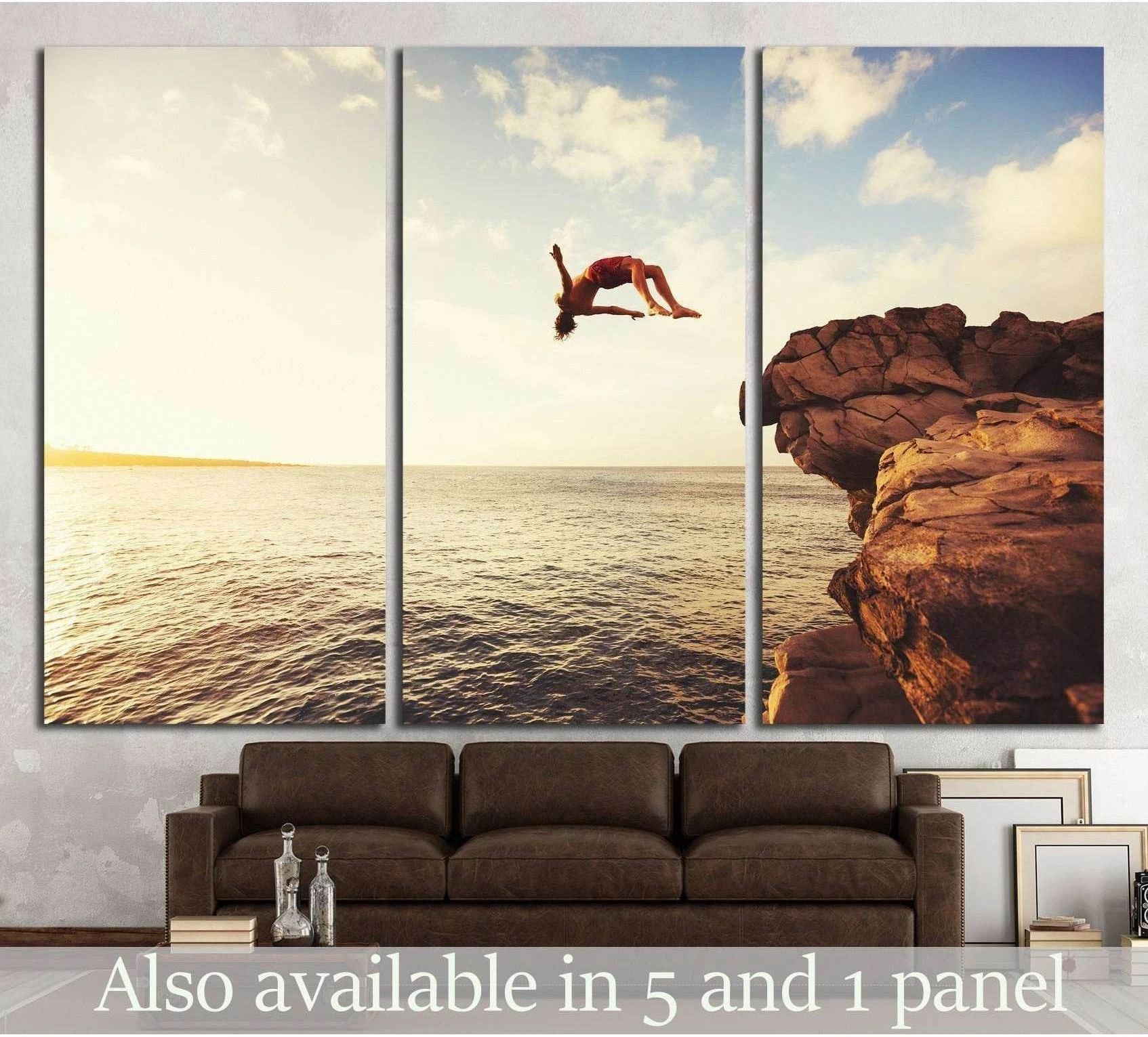 Cliff jumping canvas print with backflip over ocean at sunset beside rocky coastal cliffs
