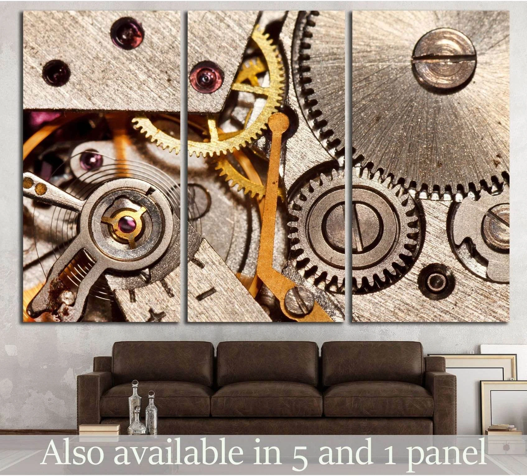 Triptych watch gears canvas print with brass and steel clockwork close-up hung above a brown sofa in a modern office