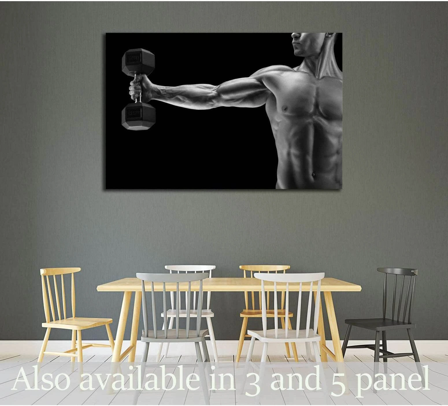 Black and white fitness canvas print with muscular man holding a dumbbell, displayed in a modern room