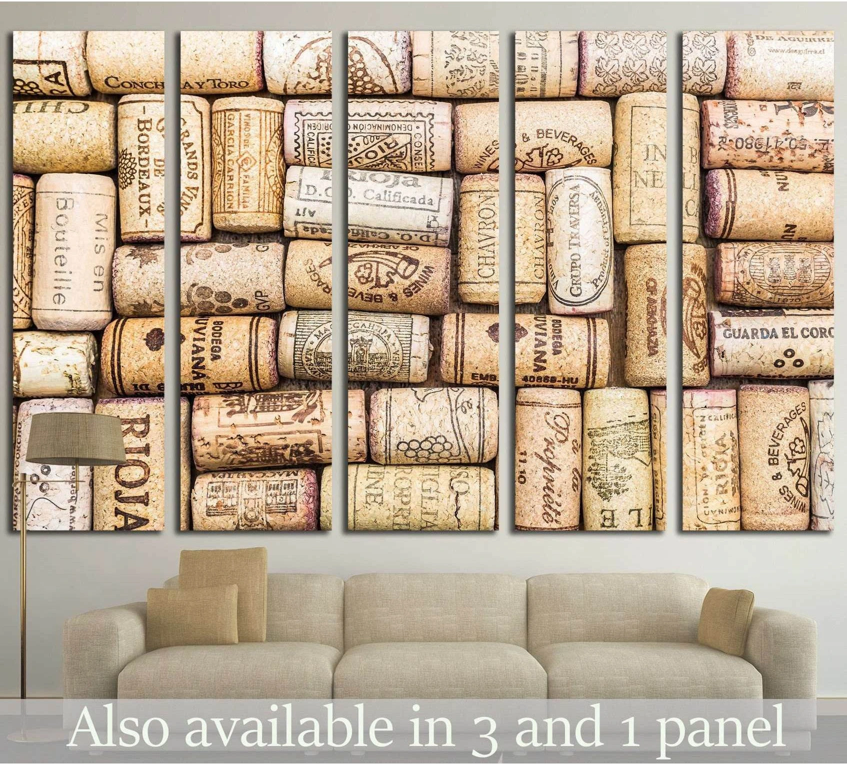 Wine corks canvas print collage hung above sofa in a neutral living room mockup