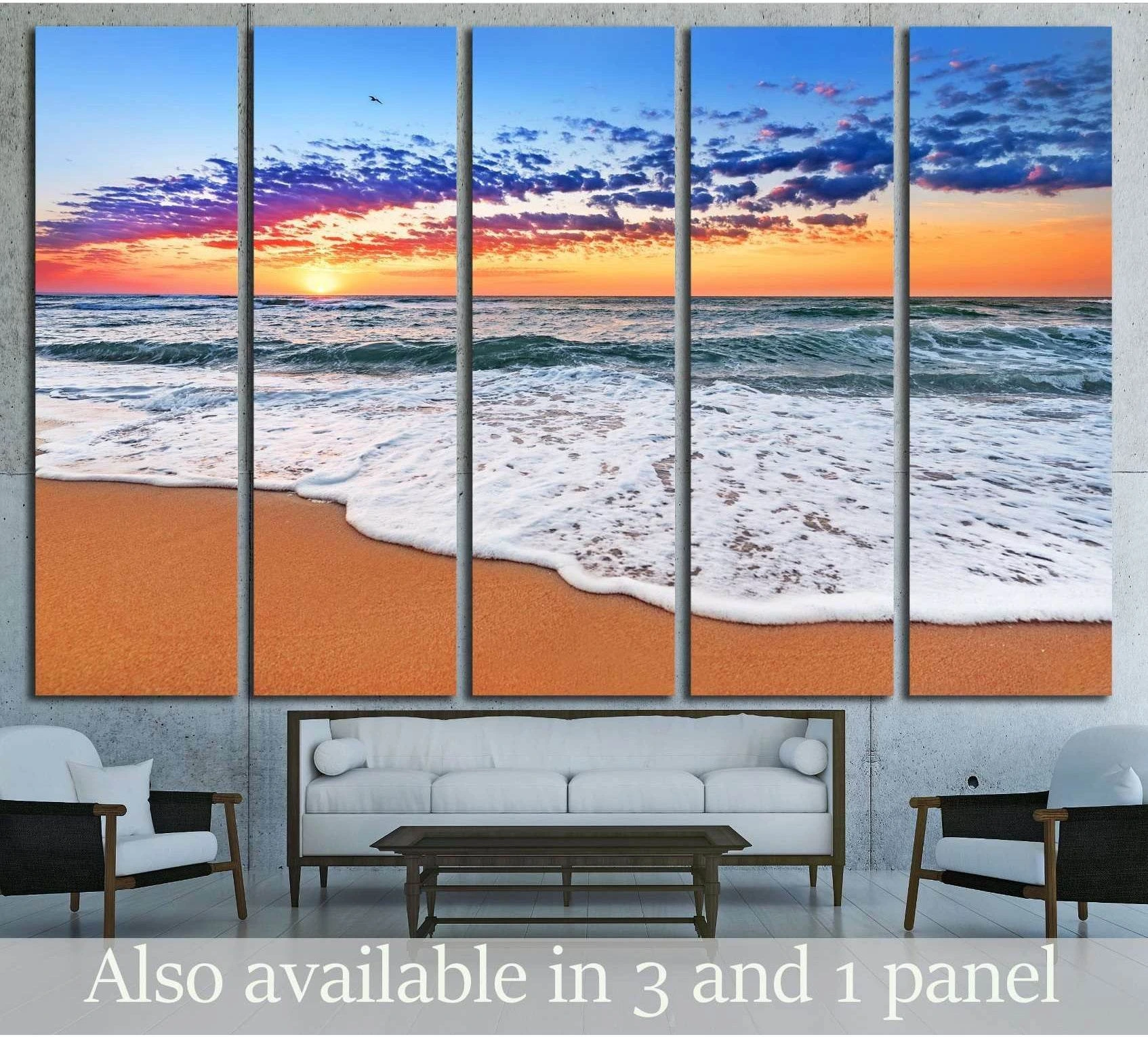 Colorful ocean beach sunrise. showing sea water, shoreline and horizon depth.