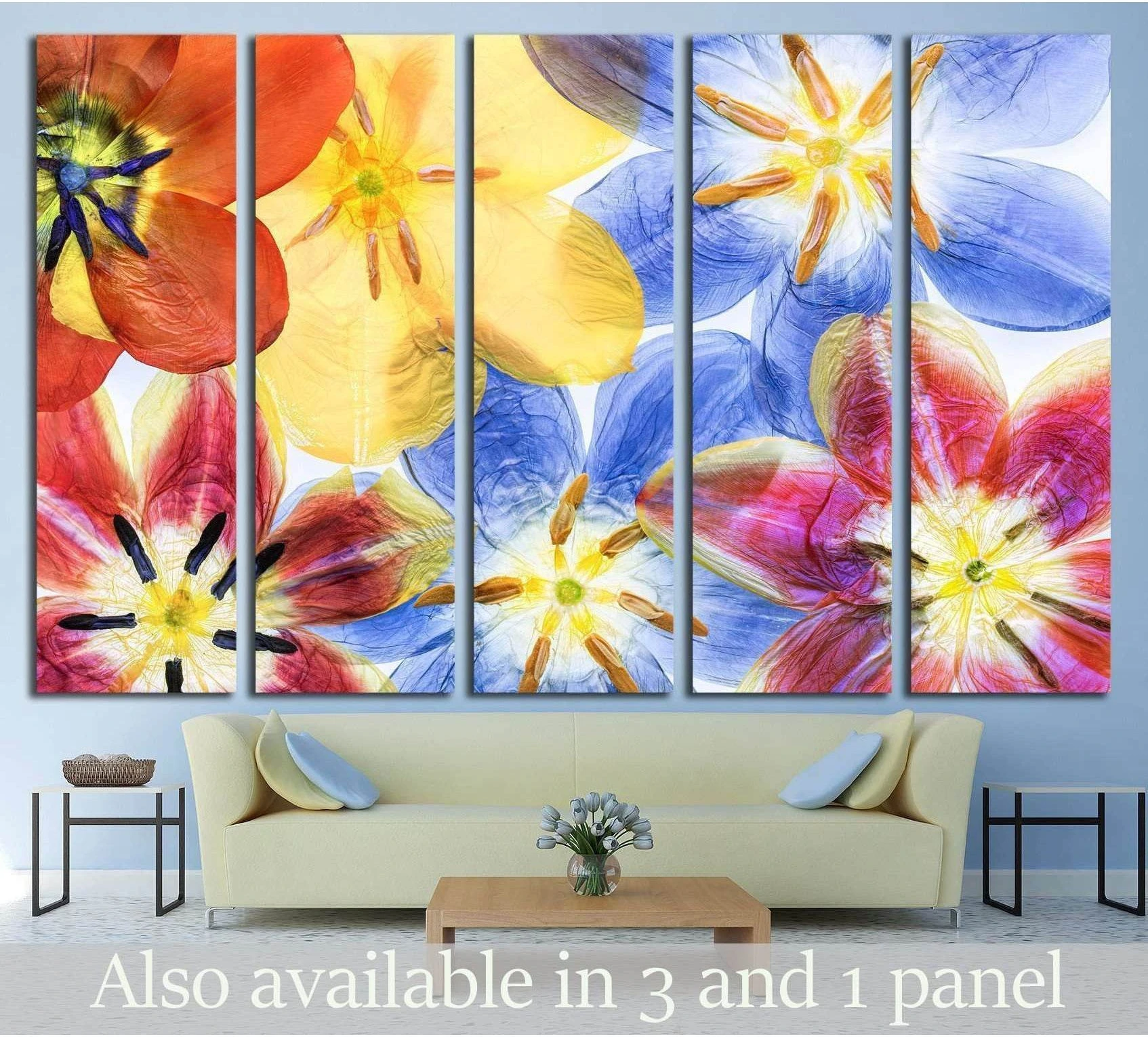 Five-panel pressed tulip canvas print with vivid red, yellow, blue, and pink blooms above a sofa