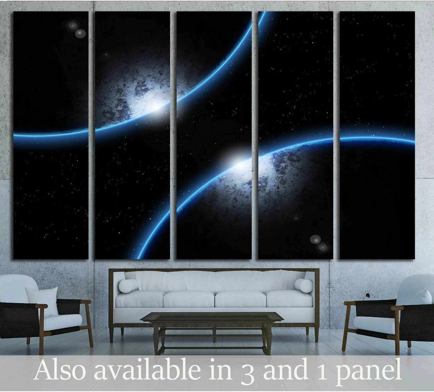 Twin blue planets space canvas print hung above a sofa in a modern living room