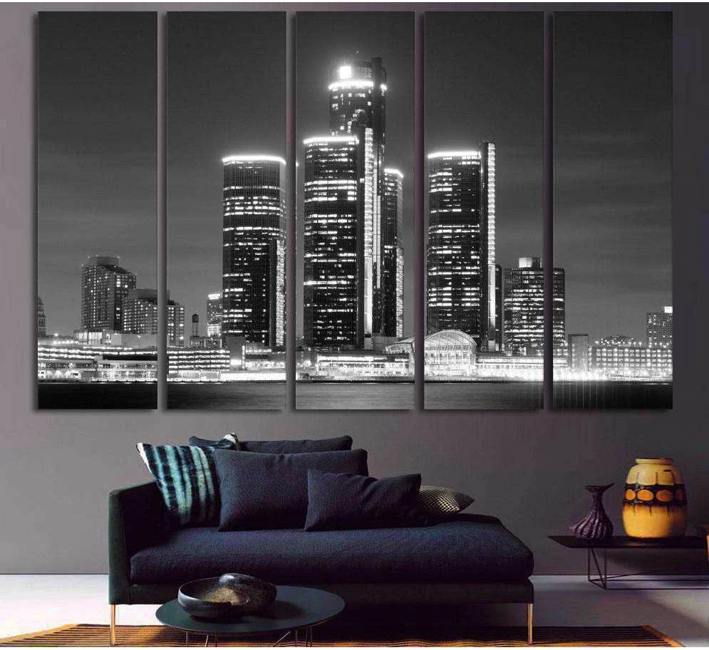 Black and white Detroit skyline canvas print in five panels above a sofa in a modern living room