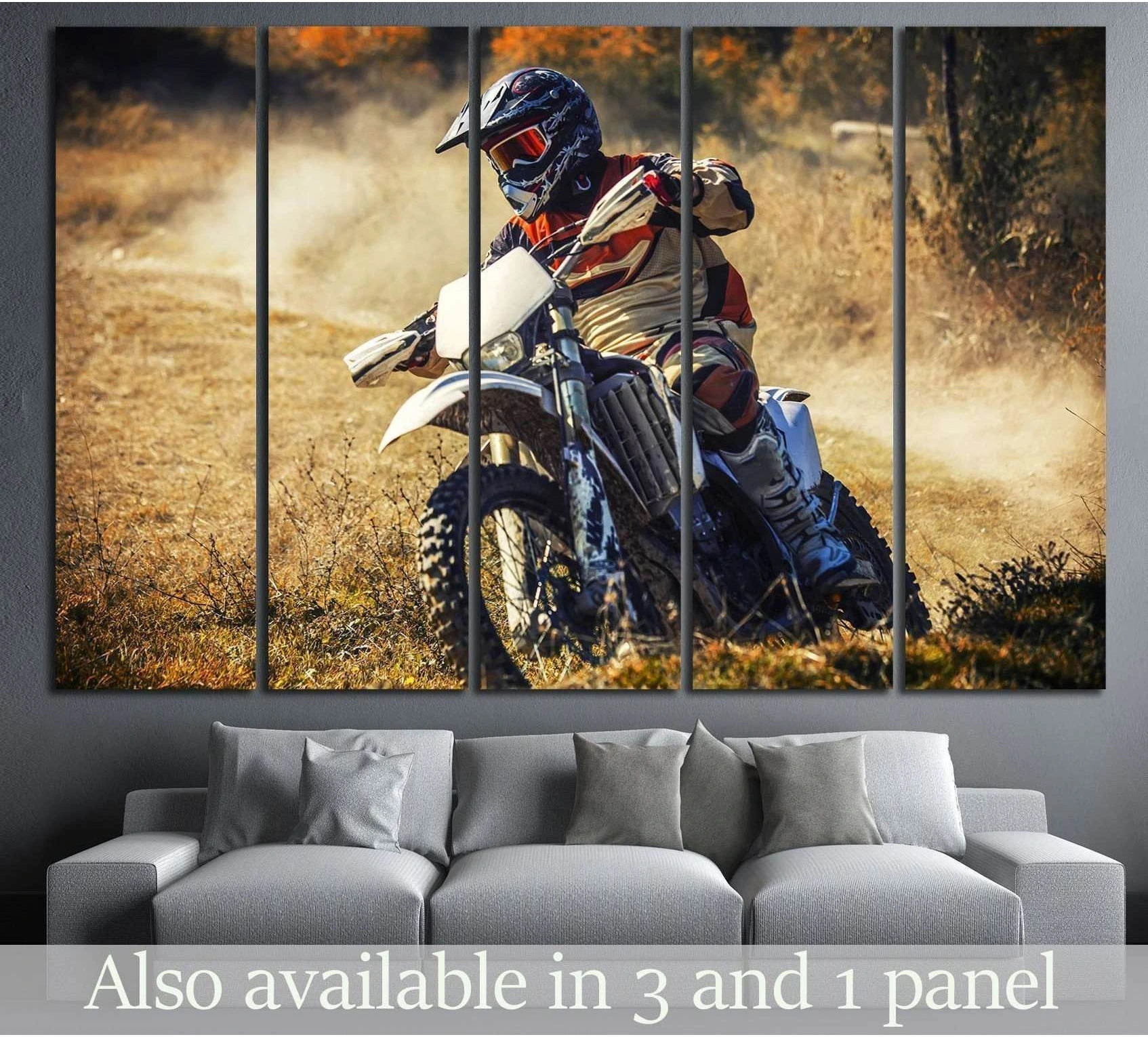 Motocross rider dirt bike canvas print kicking up dust above a sofa in a modern living room