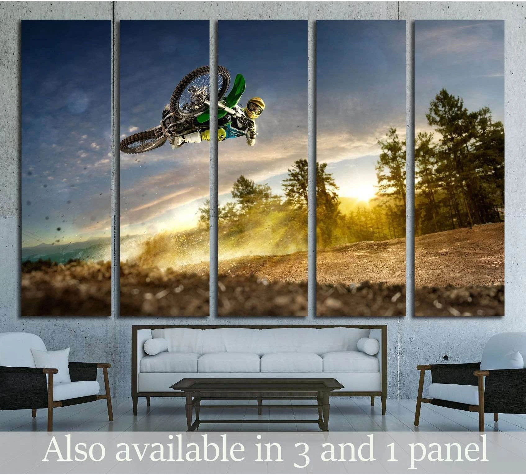 Dirt bike canvas print with motocross rider mid-air at sunset above a sofa in a modern living room